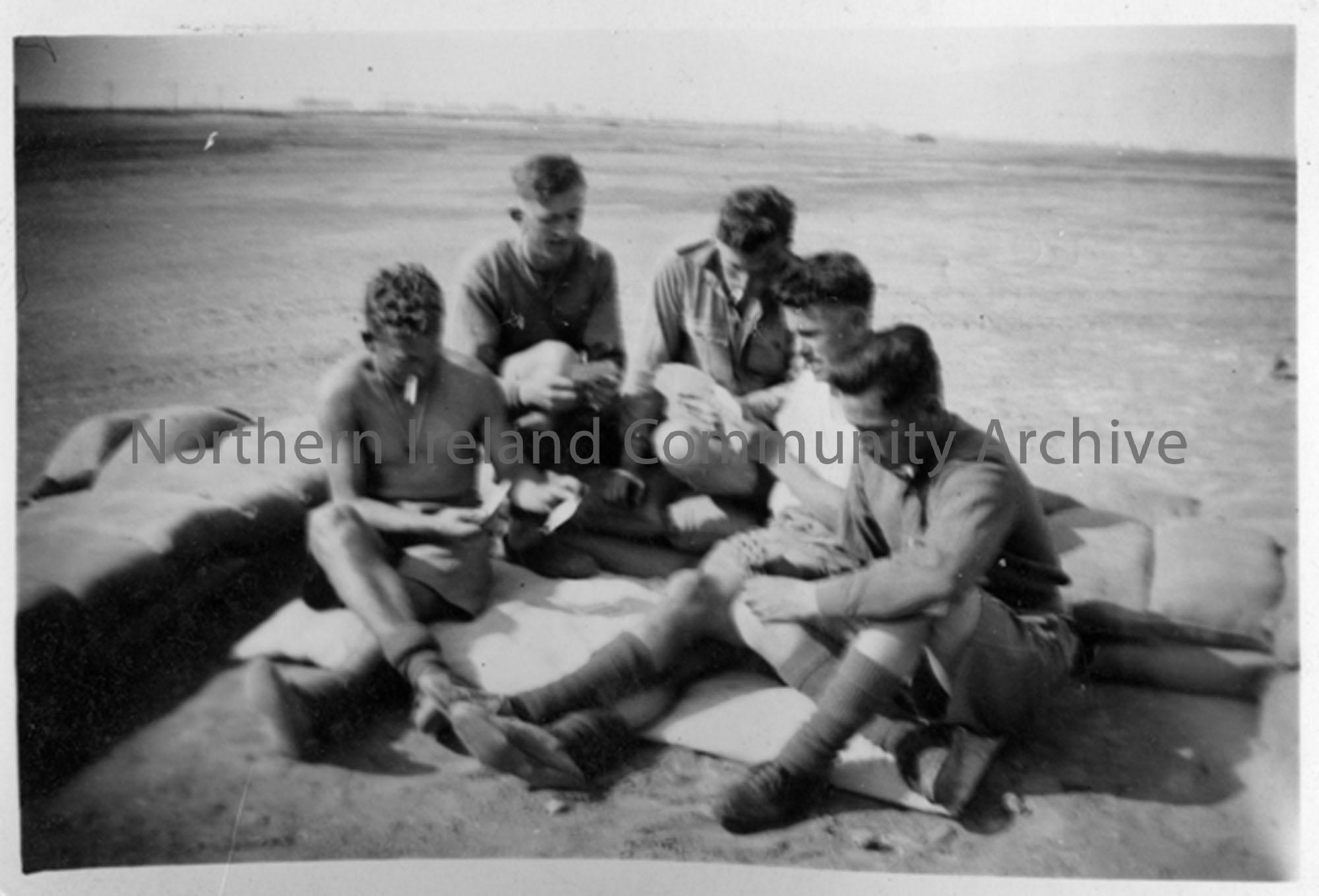 Group of soldiers playing cards