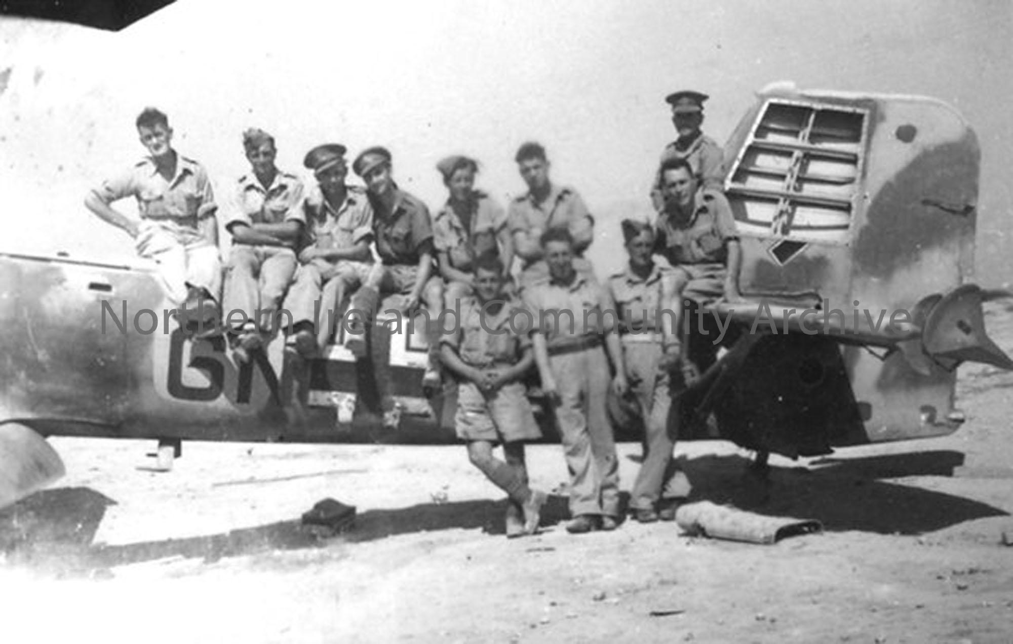 Soldiers sitting on an aircraft