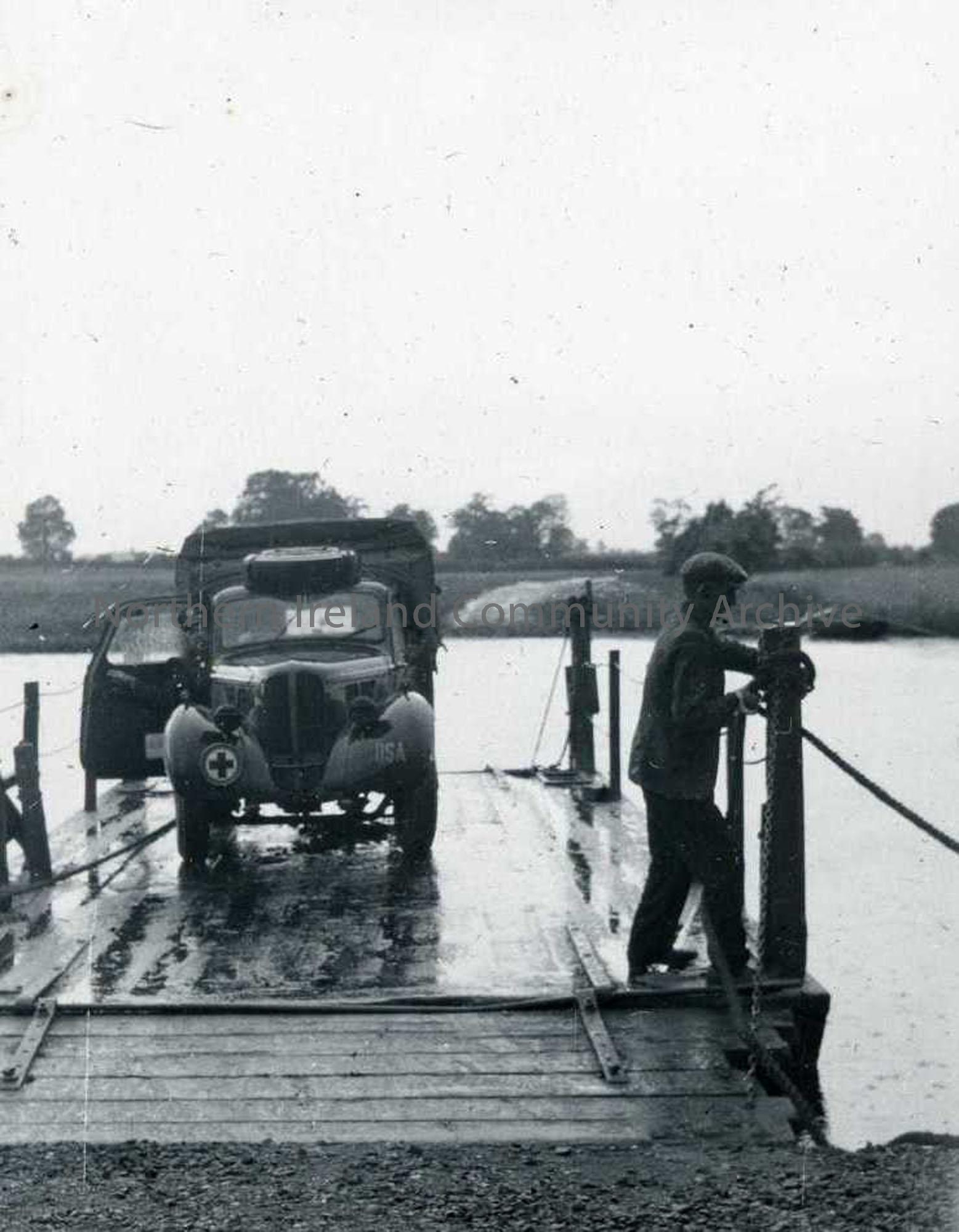 Vehicle on river crossing raft as titled by Sam Henry