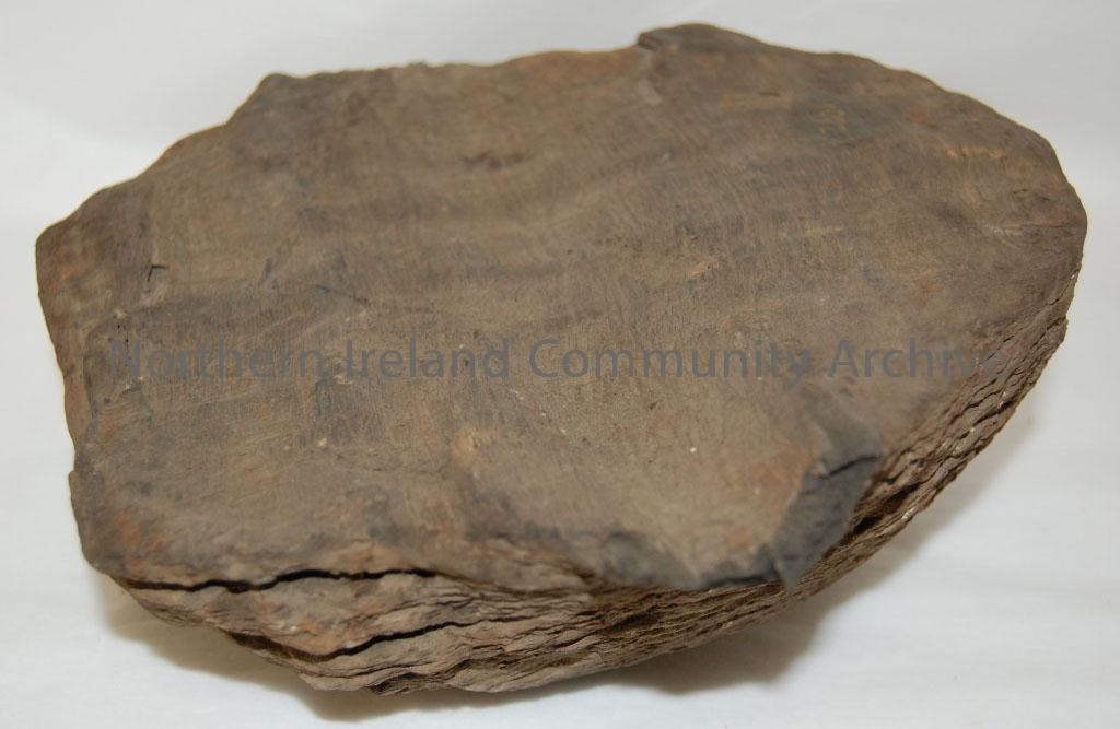 Dome shaped piece of wood with flat base and concentric grooves evident. – 1992.240 (2)