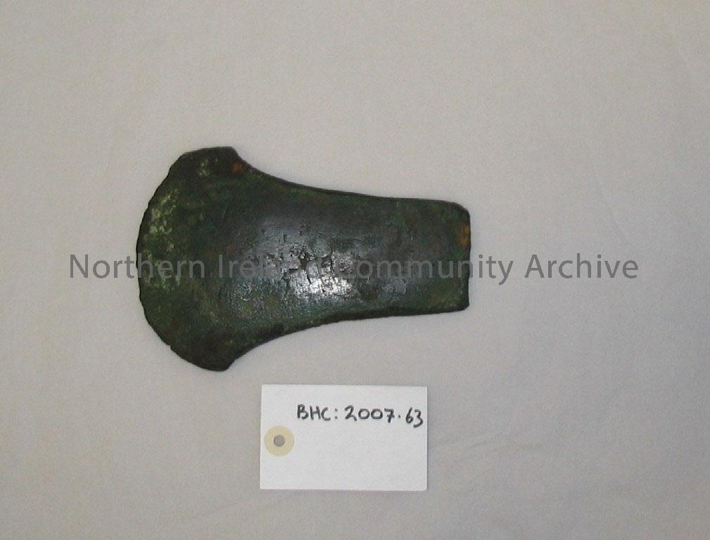 flat axe, bronze. Found in Co. Antrim by members of the donor’s family – 2007.63 (2)