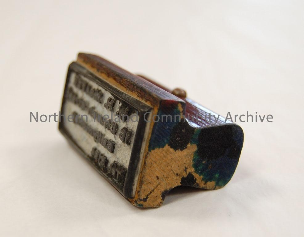 W.H McAfee with address wooden stamper. – 2010.393 (1)