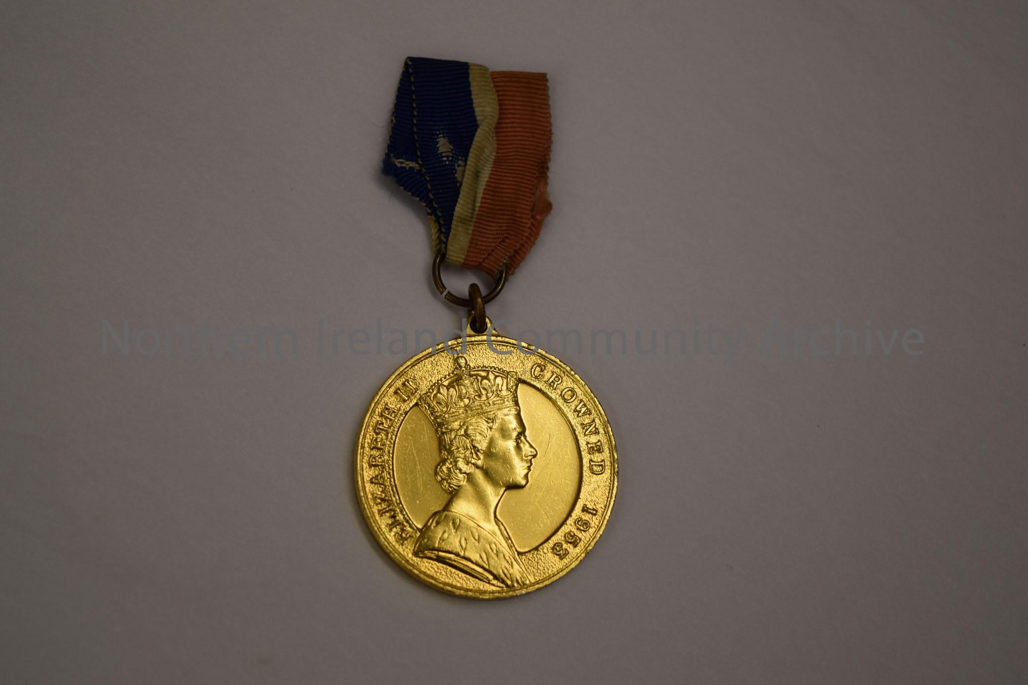 Gold Antrim County Education Committee Coronation medal with blue, white and orange ribbon. – 2015.153