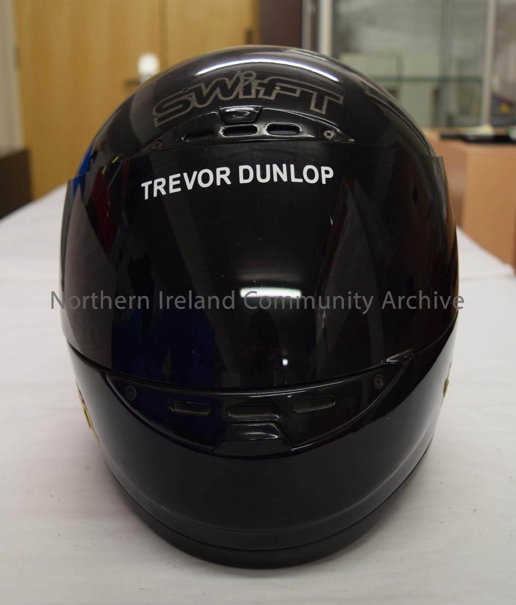 Swift motorcycle helmet belonging to Trevor Dunlop. Completely black helmet with Road Racing Ireland sticker on the back. – 2016.100 (2)