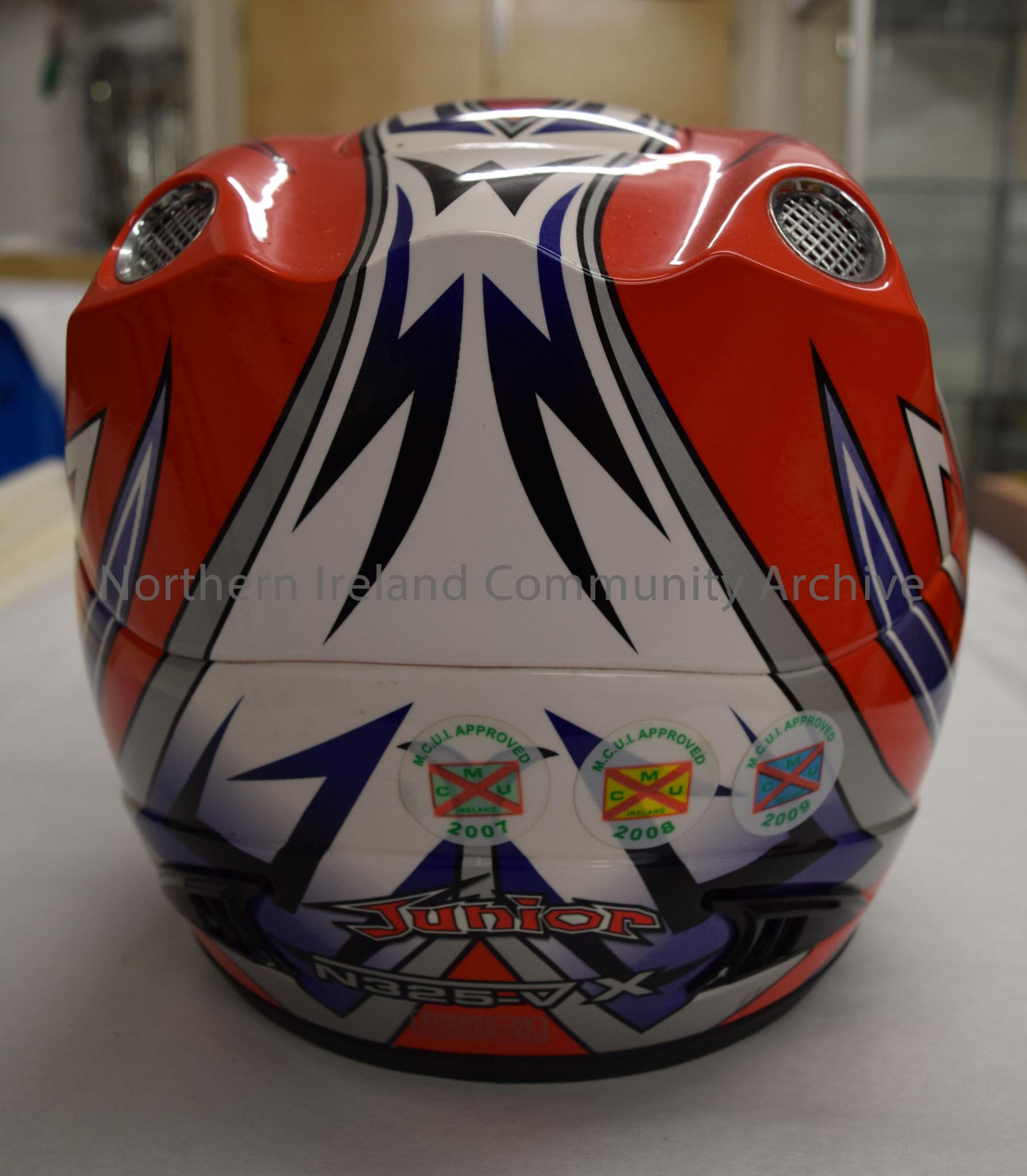 Nitro Racing motorcycle helmet belonging to William Morrell. Red helmet with white, grey and dark blue pattern. – 2016.50 (4)