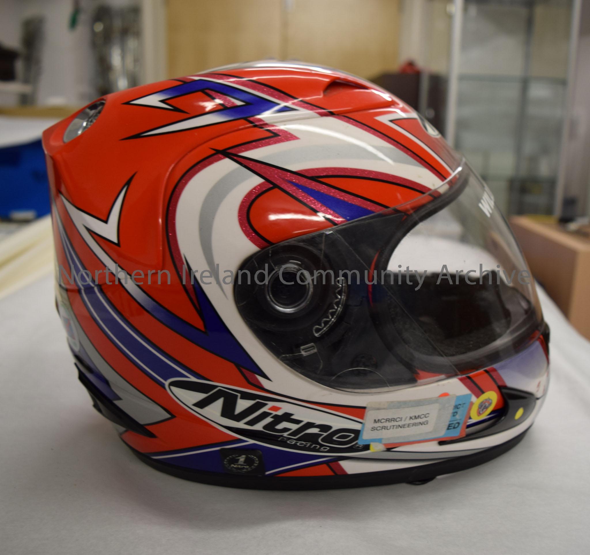 Nitro Racing motorcycle helmet belonging to William Morrell. Red helmet with white, grey and dark blue pattern. – 2016.50 (5)