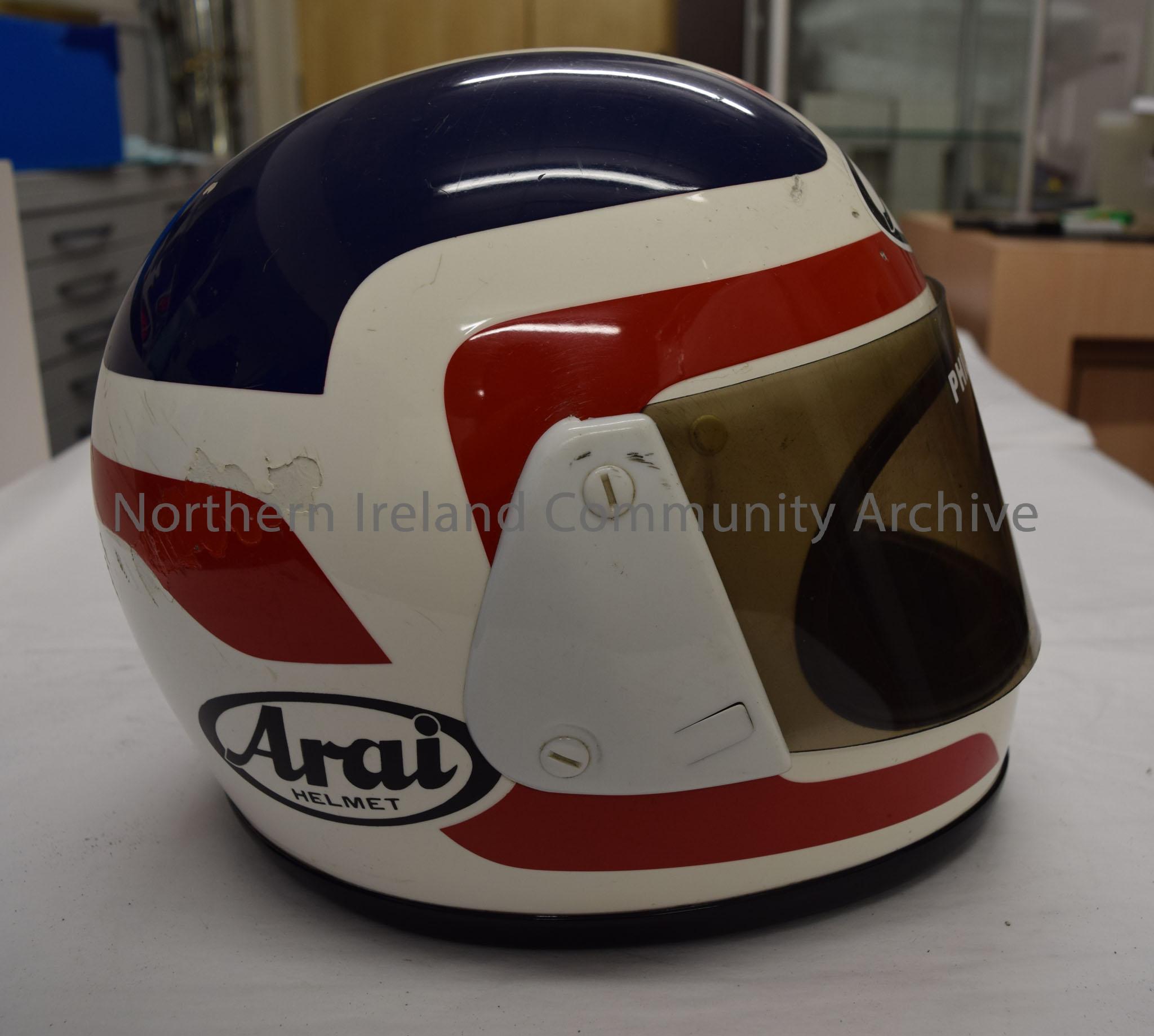 Arai motorcycle helmet belonging to Philip McCallen. White with blue and red pattern. – 2016.71 (5)