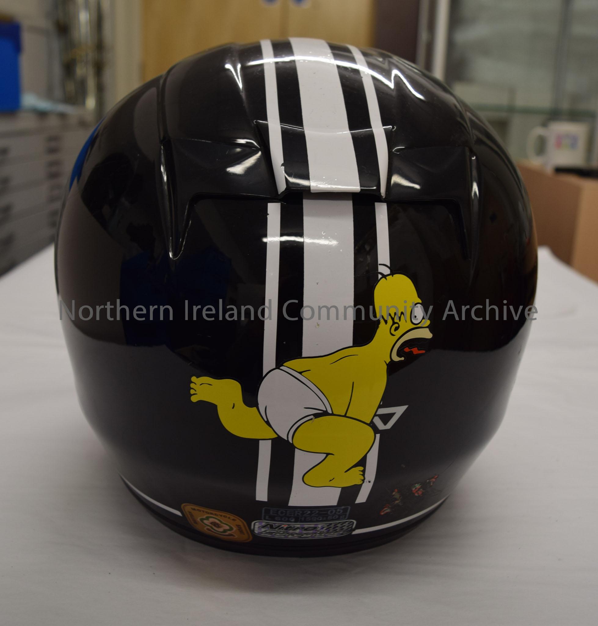 Nitro Racing motorcycle helmet belonging to Pete Simpson. Black with three white stripes down the middle and white trim. – 2016.8 (4)