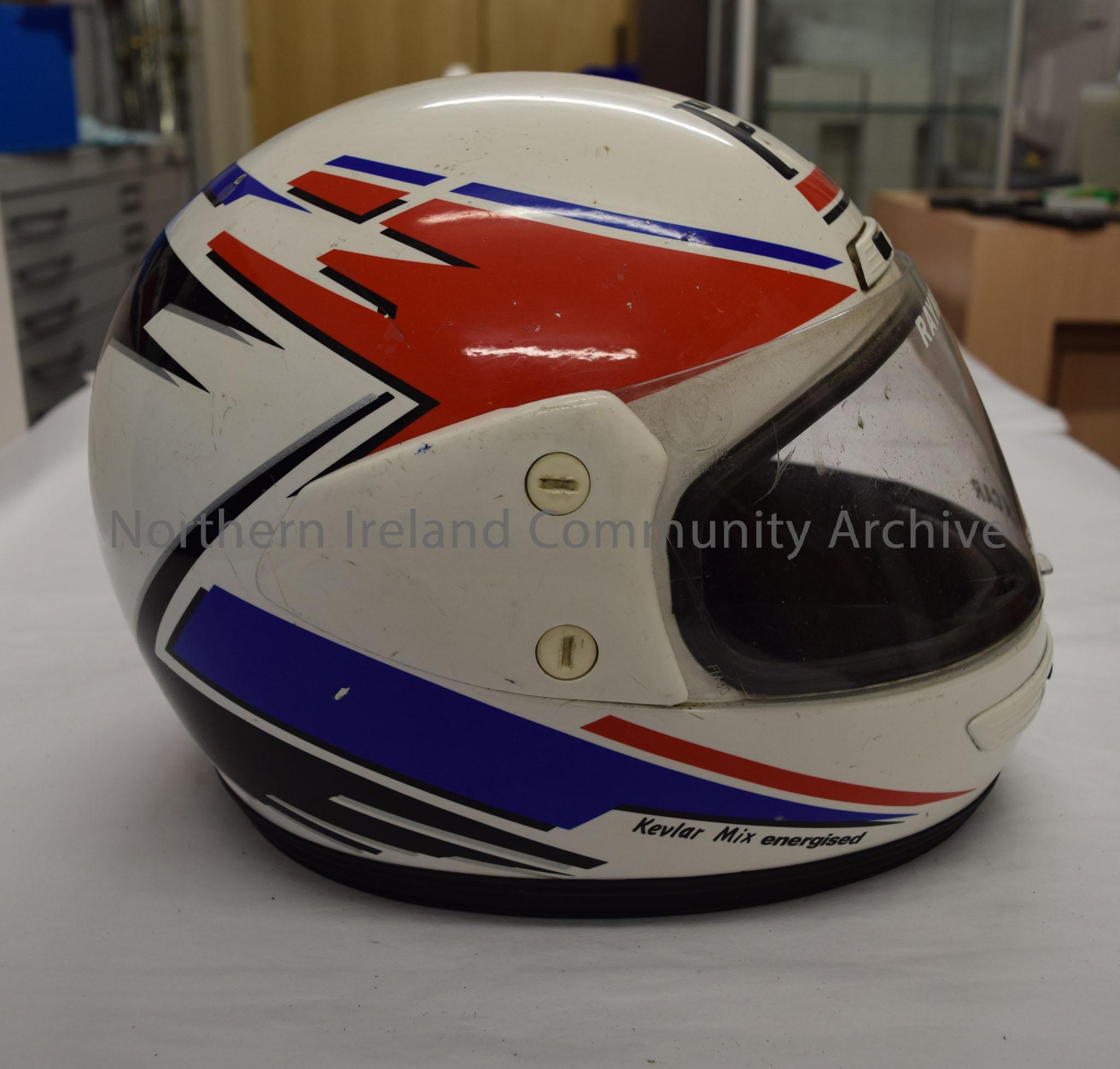 FM by Fimez stock car helmet belonging to Raymond Hodge. White with a blue, red and black pattern on the sides. – 2016.81 (5)