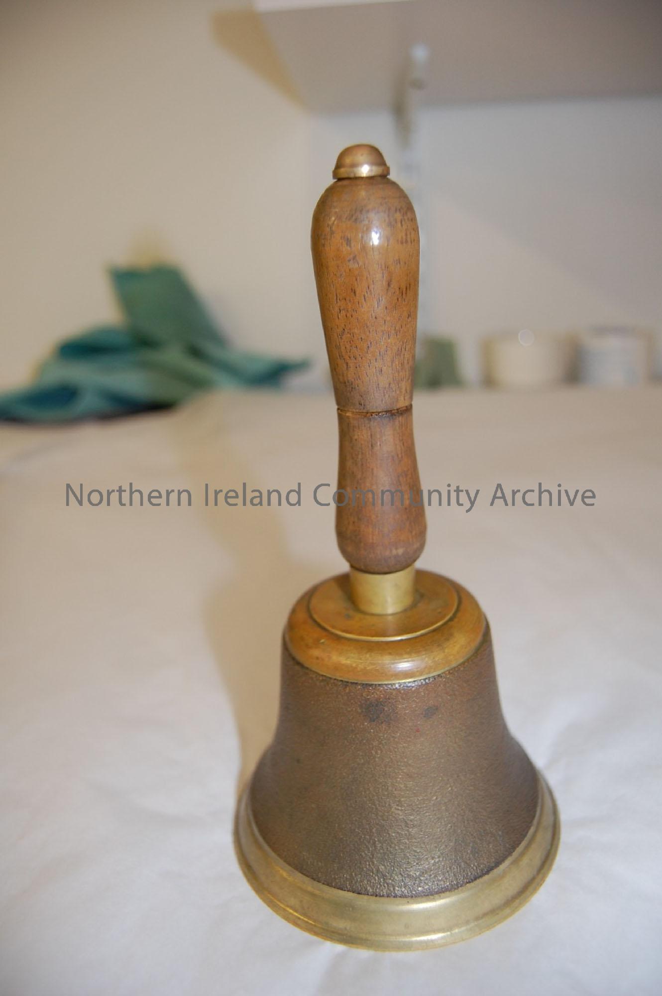Killyrammer Primary School Bell. Hand bell, brass with wooden handle