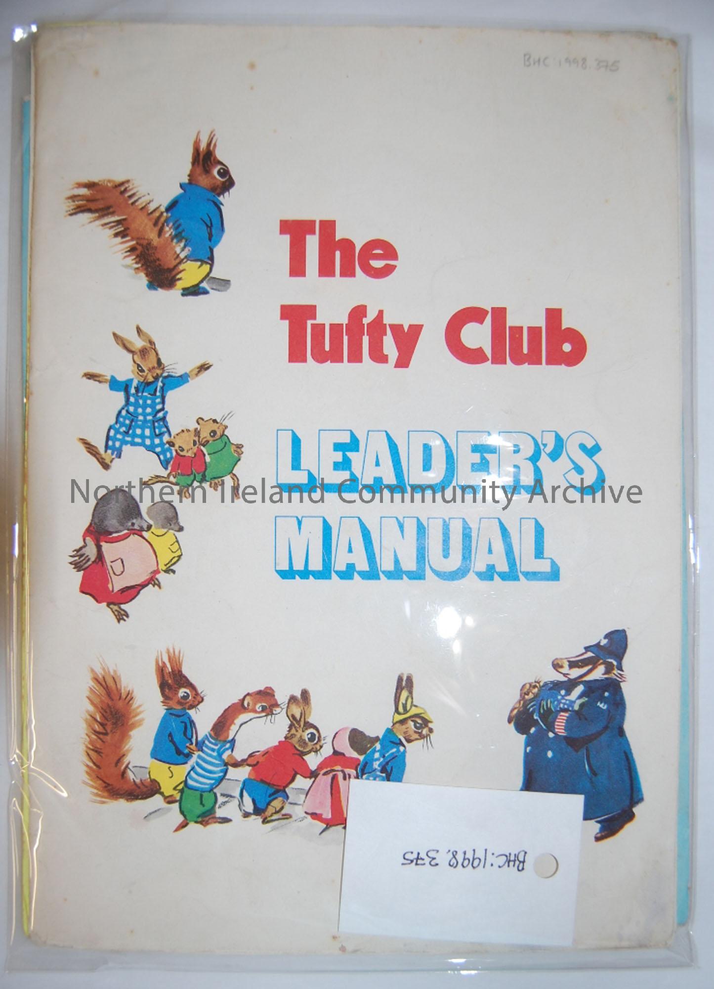 ‘The Tufty Club: Leader’s Manual’. White folder, with cartoon animals on cover. Contains teaching material for road safety.