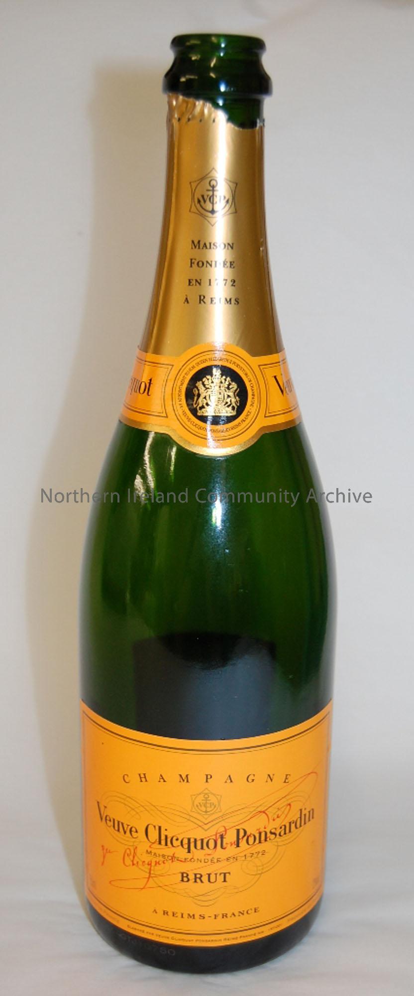 Champagne bottle which celebrated the win of Ian Hutchinson in the 600cc at the Kennedy International North West 200 races, 2006. The race was sponsor…