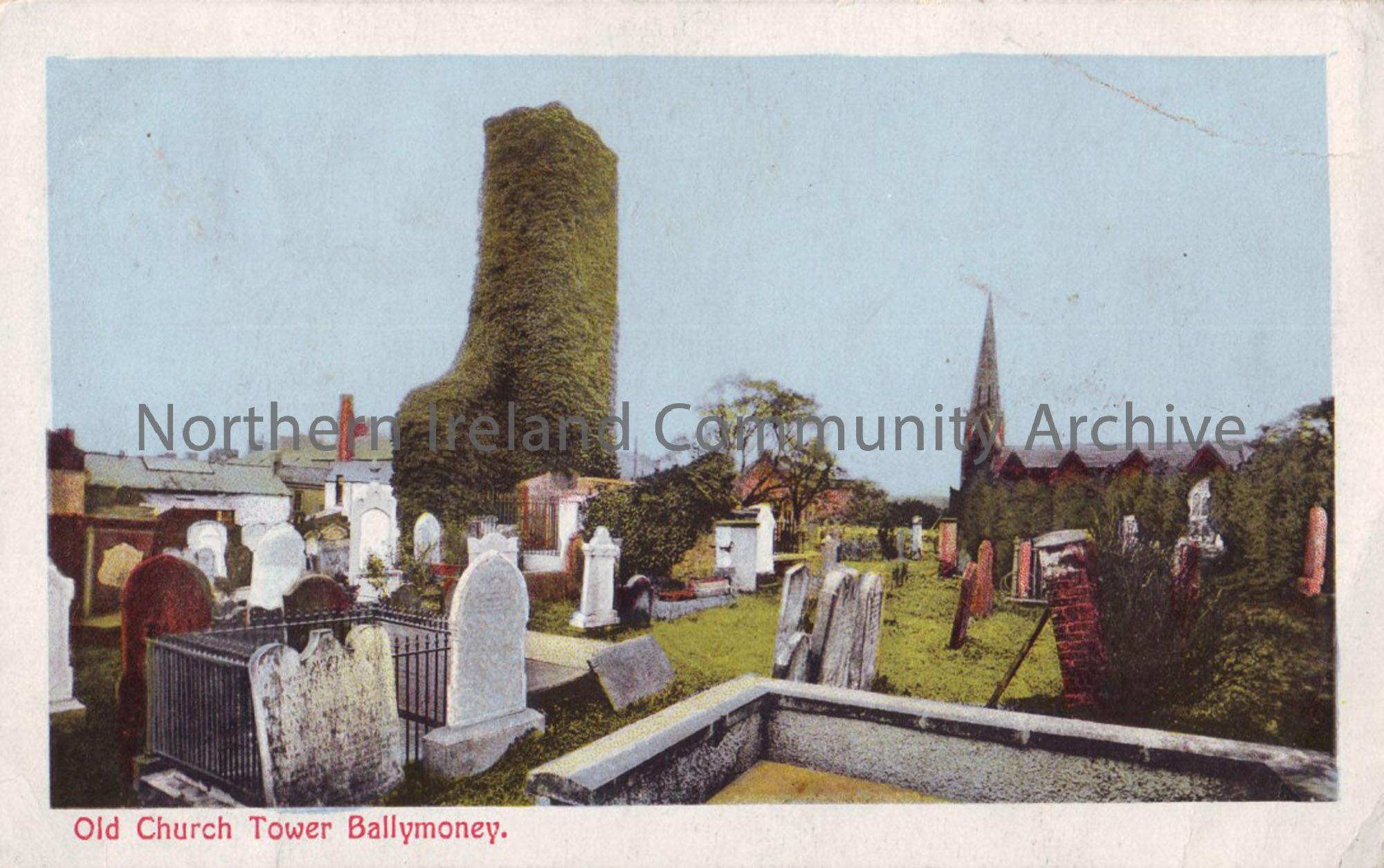 Coloured photograph of the Old church Tower, with graveyard in the foreground
