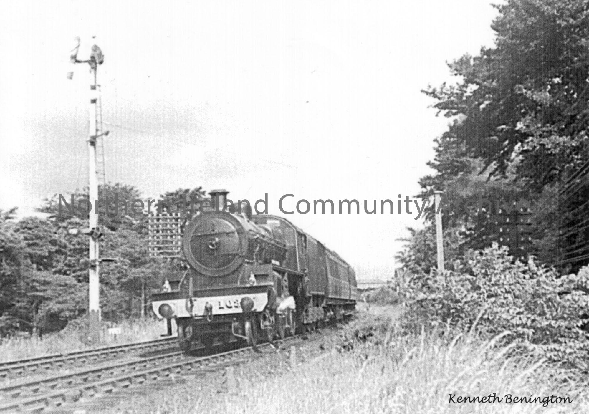 W class 2-6-0 No.103 ‘Thomas Somerset’ is seen near Ballymena Goods yard with a Derry Train.