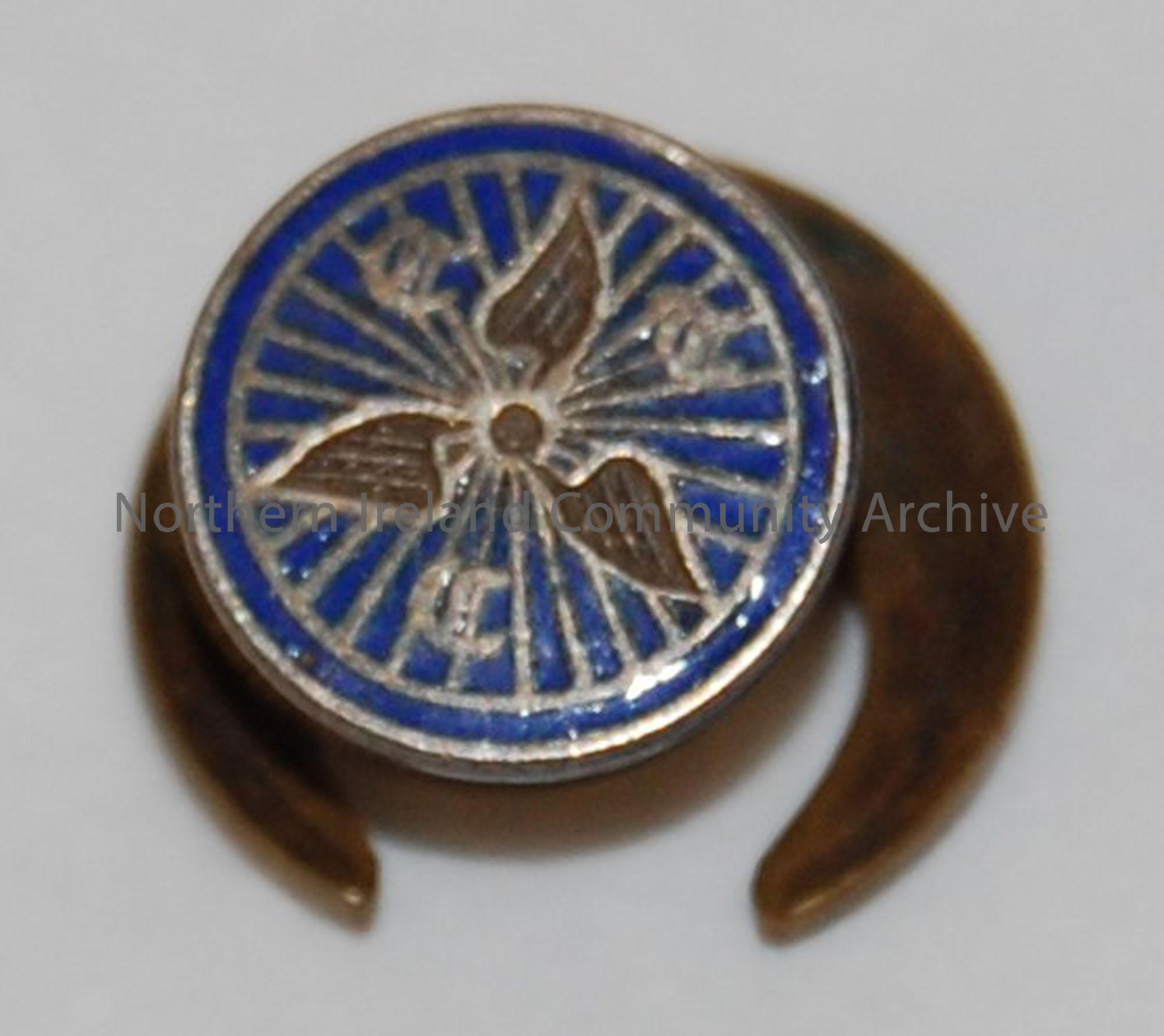 Cycle Touring Club badge. Brass with blue enamel background. 3 ‘leaf’ shape design with letters C, T, C.