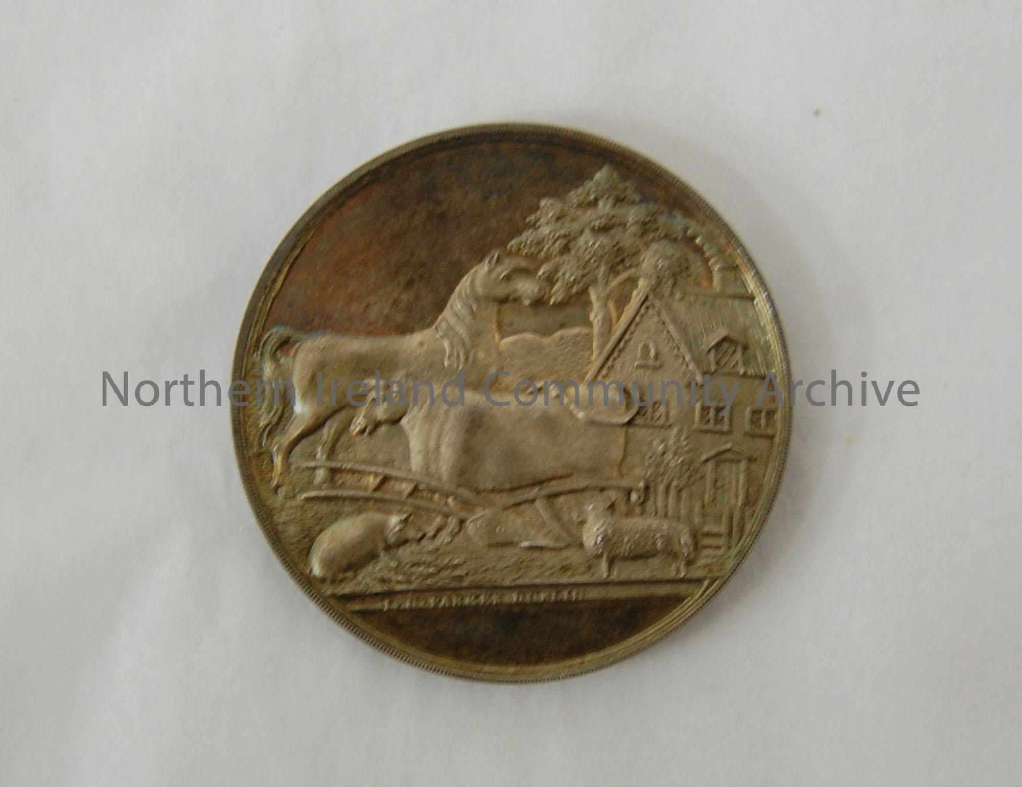 Route Farming Society medal. Awarded to Mr. Andrew Hunter, Corstown. For the best two year old heifer, 1851. Inset in wooden box with red felt.