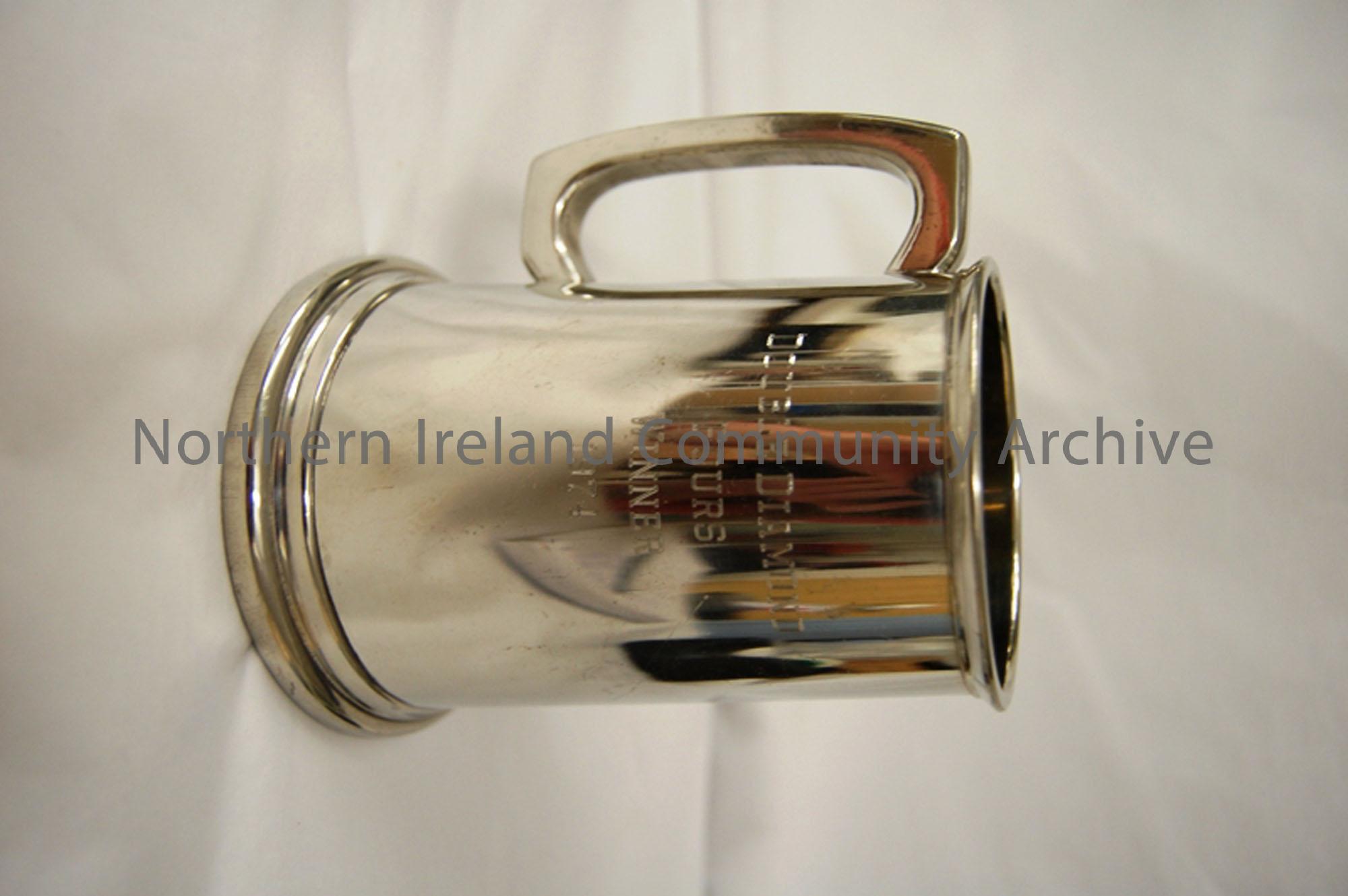 pewter tankard with handle on left side. Inscribed Double diamond fours winner 1974