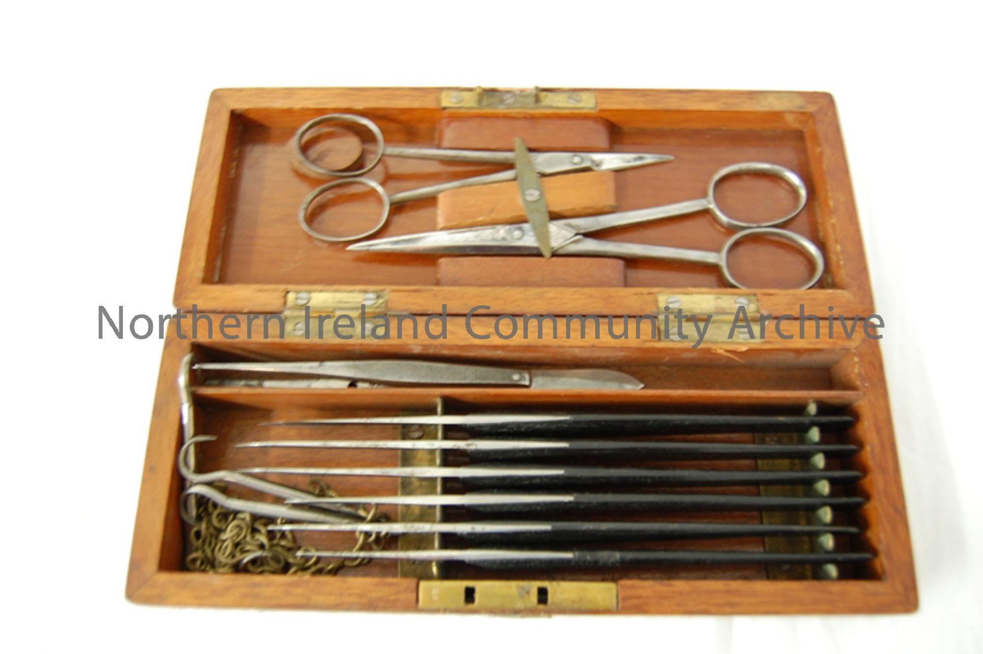 wooden box containing surgical scalpels, bought by Dr. Johnston in antique medical store.