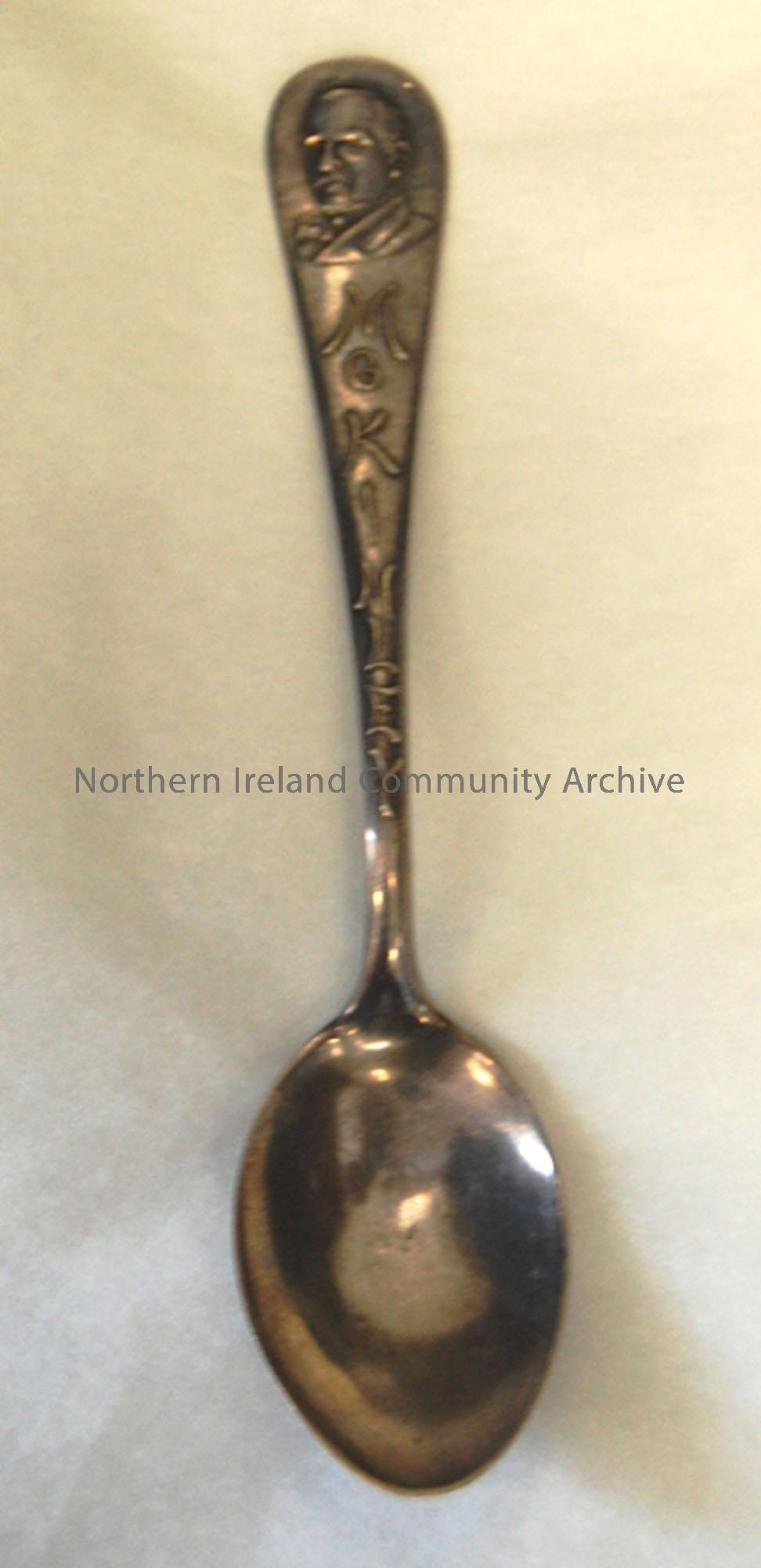Spoon embossed with McKinley’s head and name on front, dated October 20-02 on reverse; sterling silver.