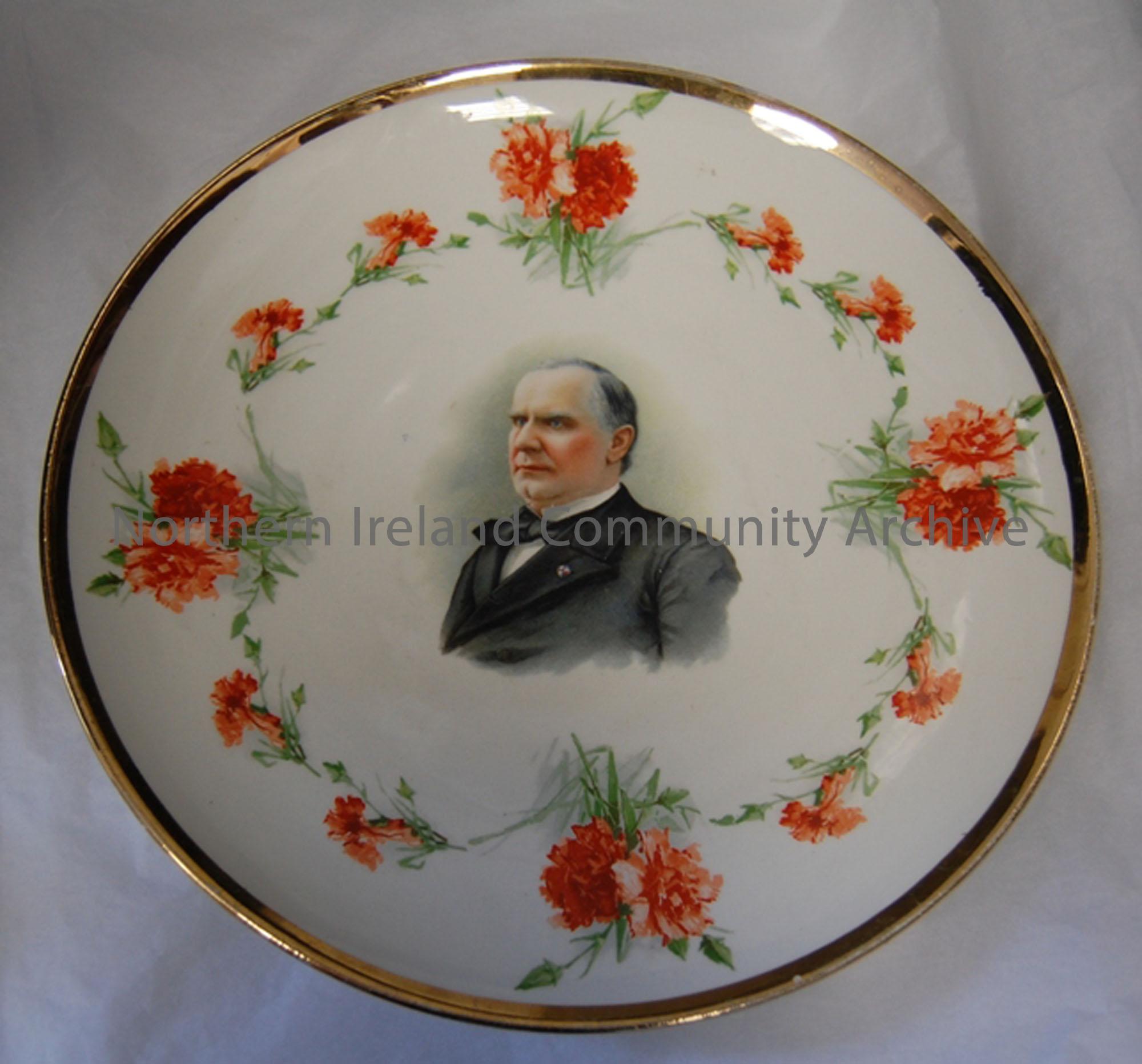 Plate with a portrait of McKinley surrounded by image of red carnations. Back stamped.