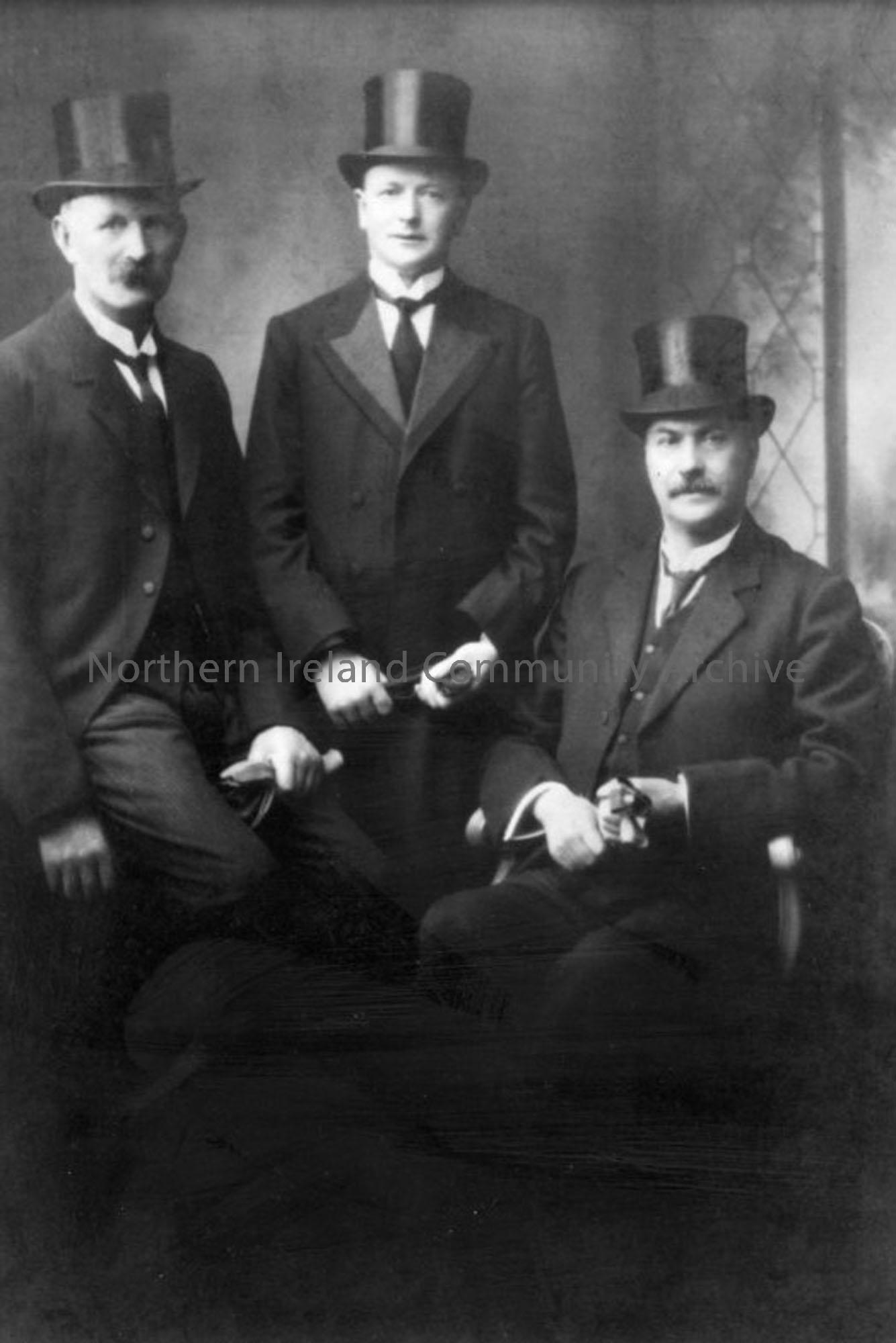 copy photograph of officers of Ballymoney Urban District Council C. early 1920’s. Photograph shows three gentlemen in top hats named left to right as:…