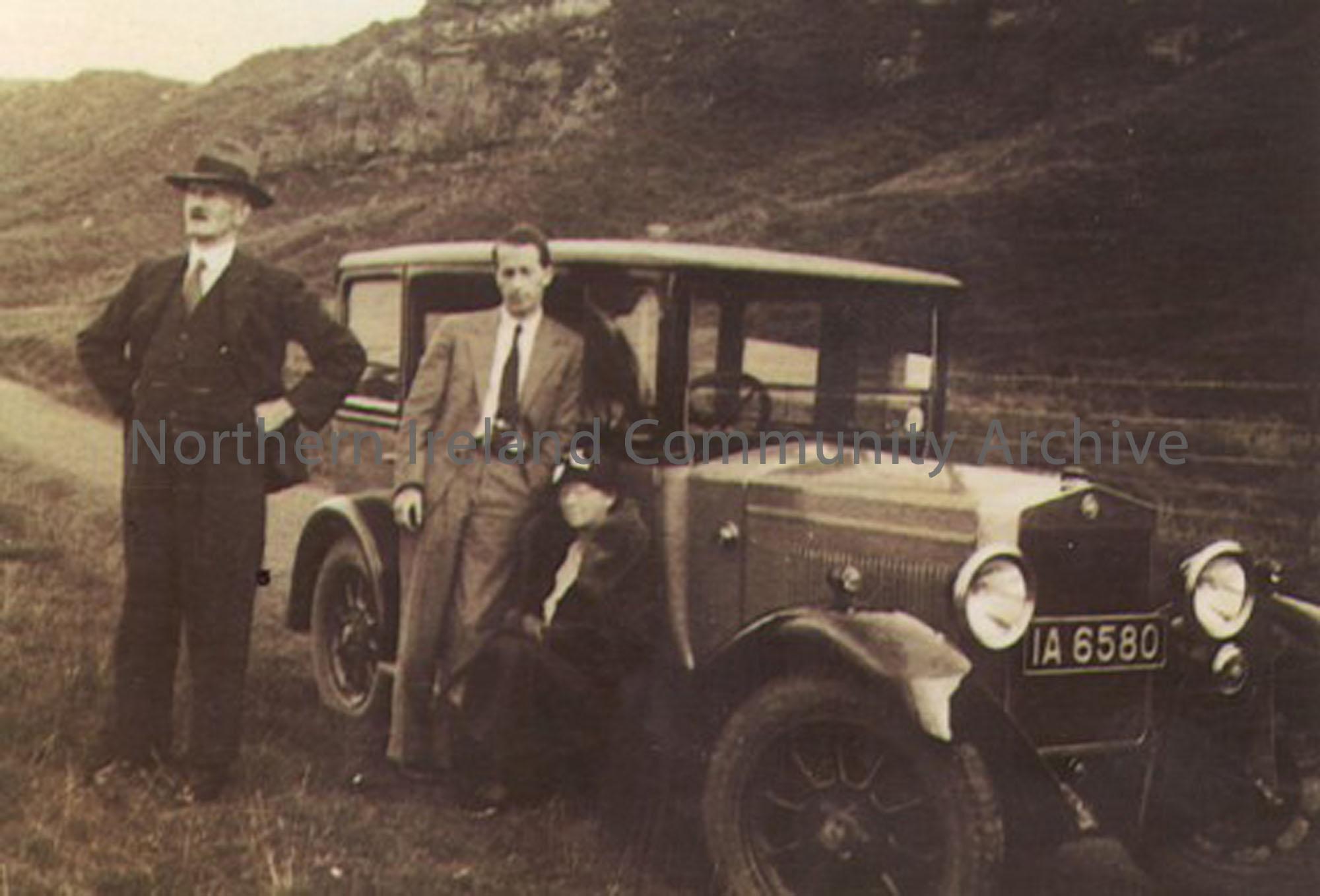Photograph of William Redpath and James Noel Redpath standing beside a car.