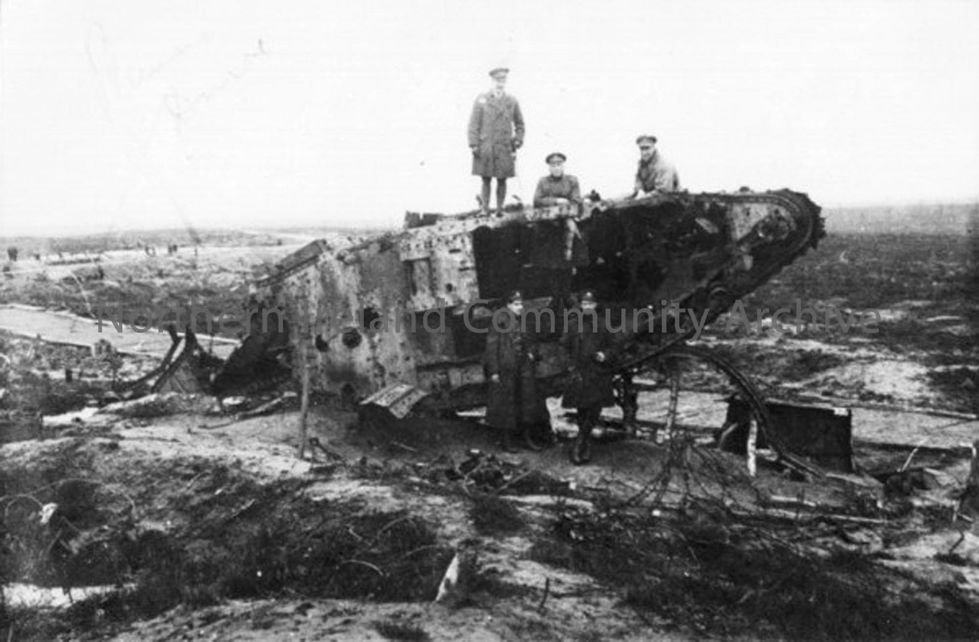 Major Robb’s colleagues examining the hulk of a British tank, again on the Ypres to Menin Road. Included are doctors Picken, Wright and Davidson. Thes…