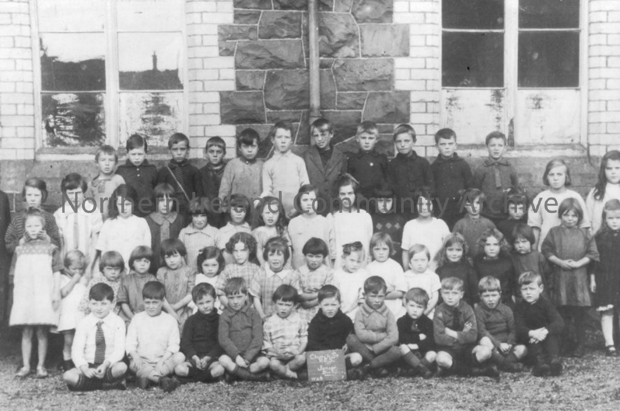 Black and white photograph of Church Street School Public Elementary beside St.Patricks Parish Church. (copies of originals) Picture is of a Junior cl…