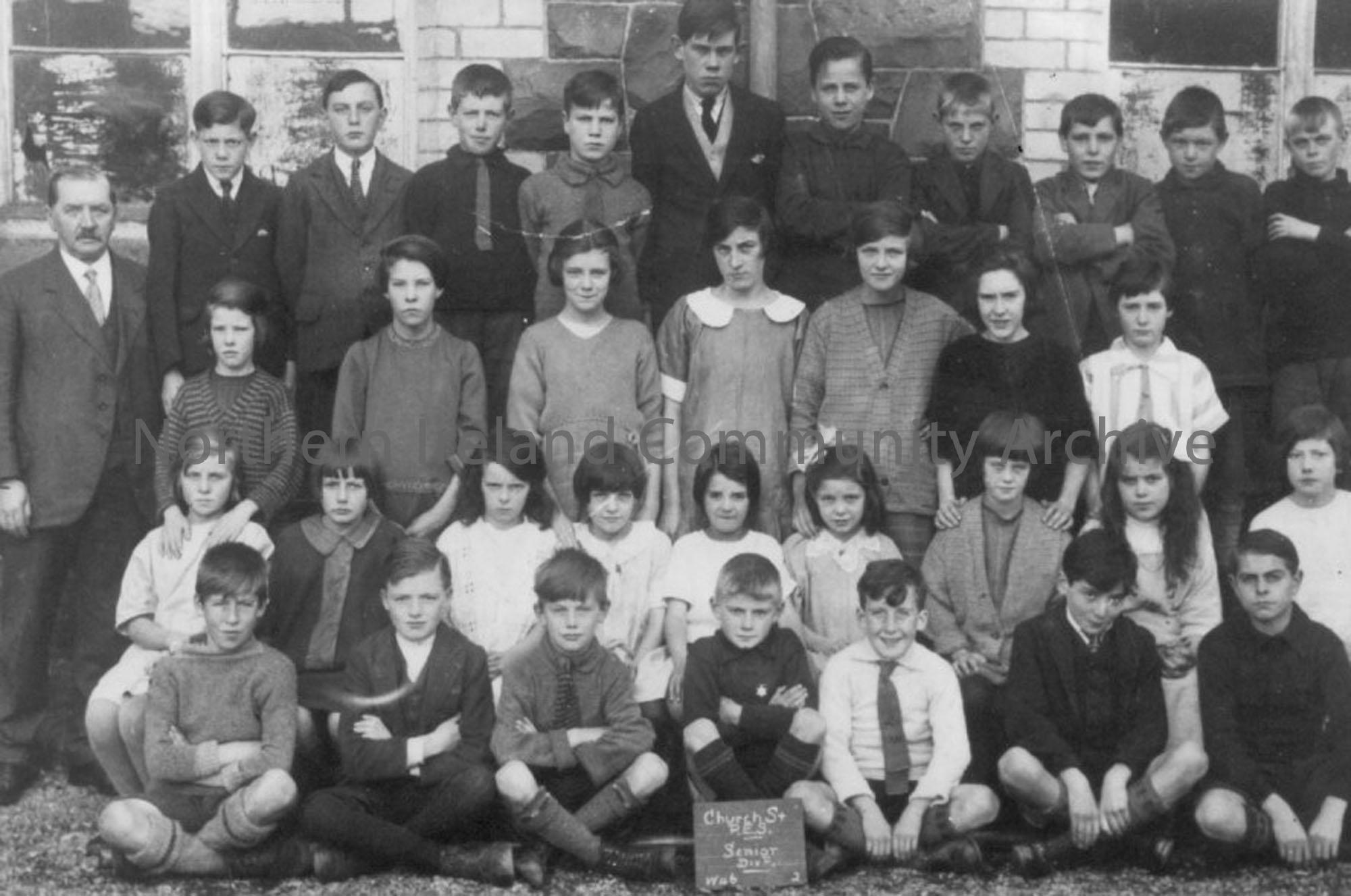 Black and white photograph of Church Street School Public Elementary beside St.Patricks Parish Church. (copies of originals) Picture is of a Senior cl…