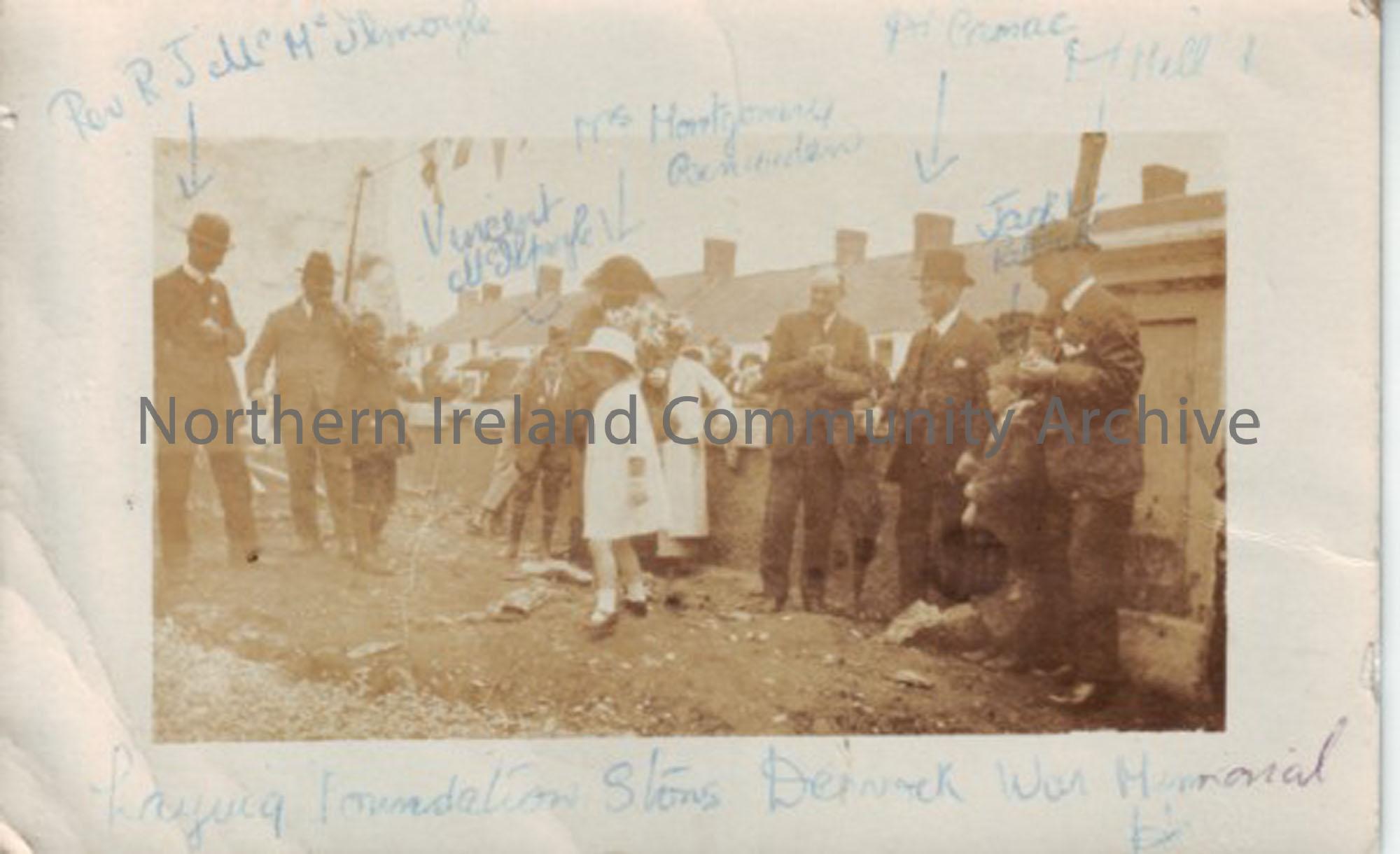 Laying foundation stone at Dervock War Memorial. Picture has names wrote on in pen, from left ot right Rev R J McIlmoyle, Vincent McIlmoyle, Mrs Montg…