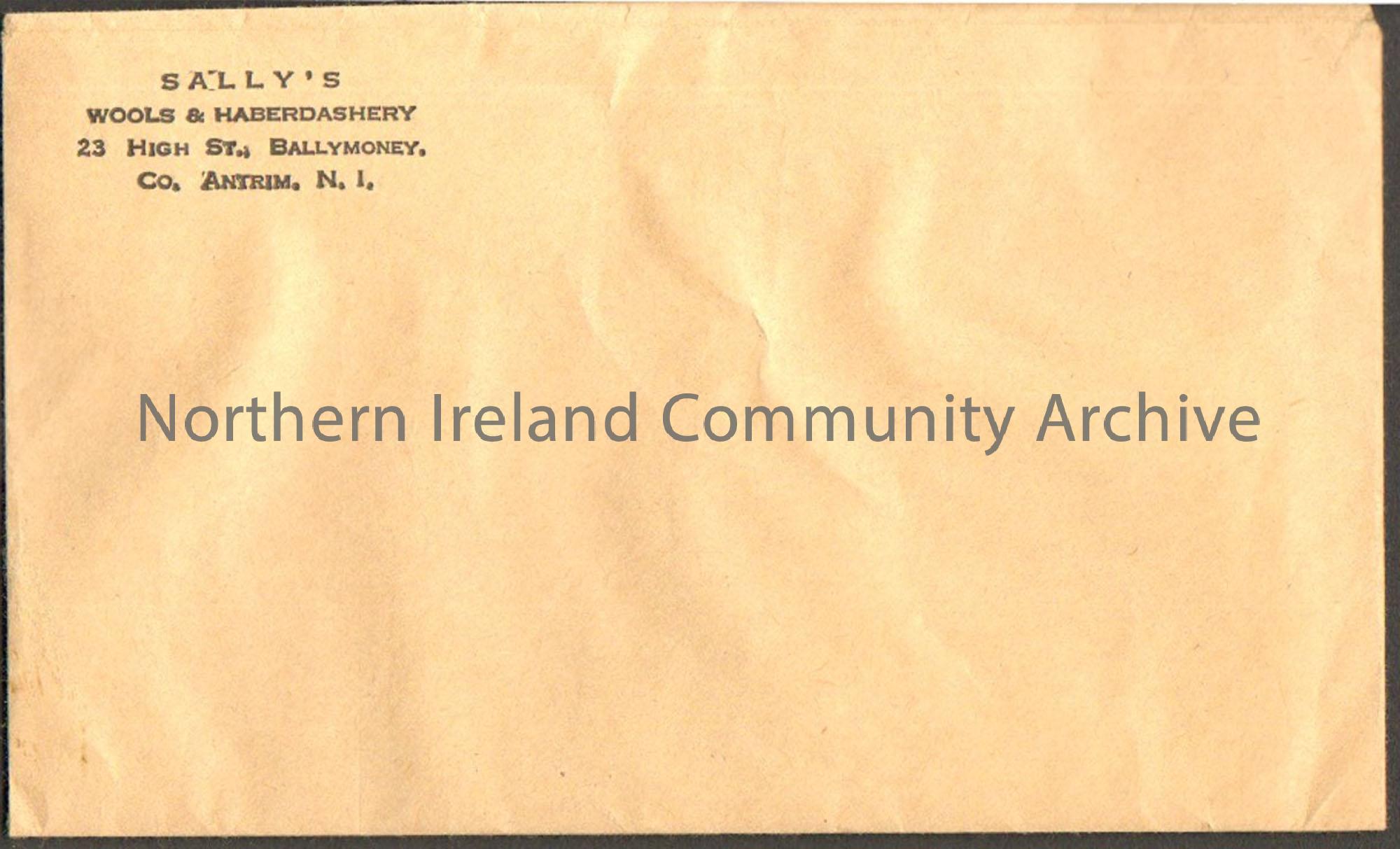 Brown envelope with stamp advertising Sally’s Wool and Haberdashery printed in black in top left corner