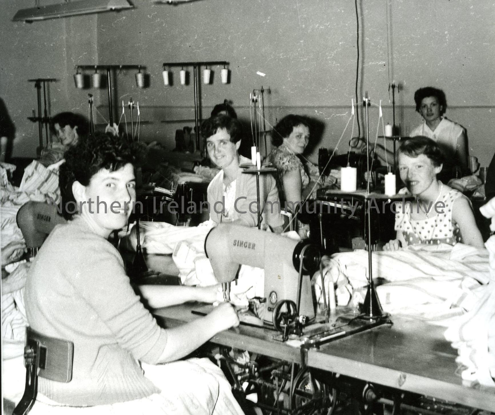 Black and white photograph of women working at the McDermott shirt making factory, Coleraine. Copyright of the photograph remains with the Coleraine C…