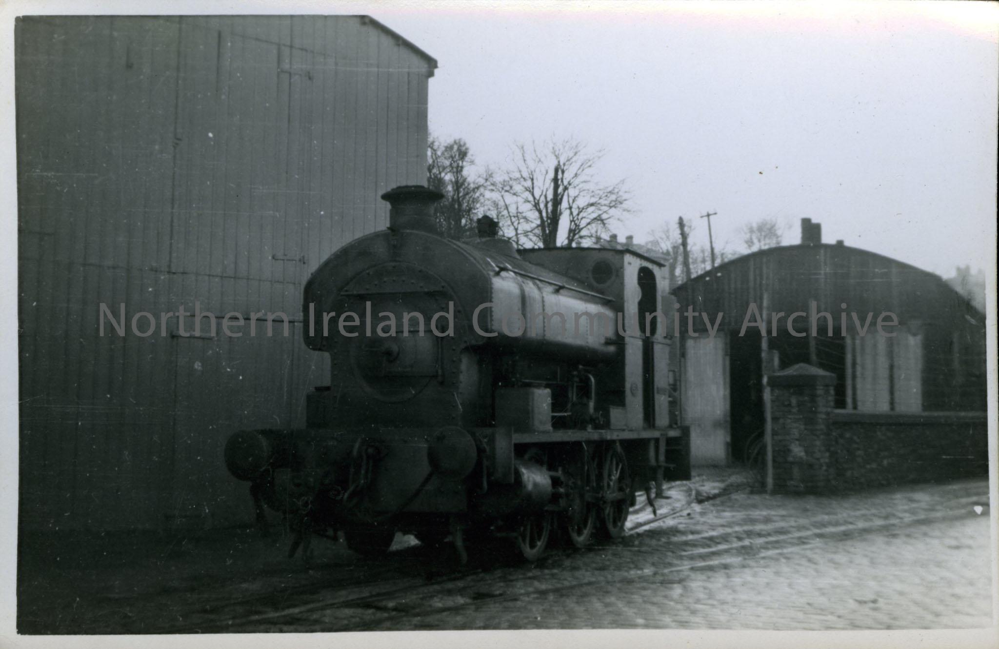 Train and sheds. (Black and white). Written on the reverse is – Londonderry Port and Harbour Authority No.3 (Avonside). 12/52 N.F. N.N Forbes 15.2.53