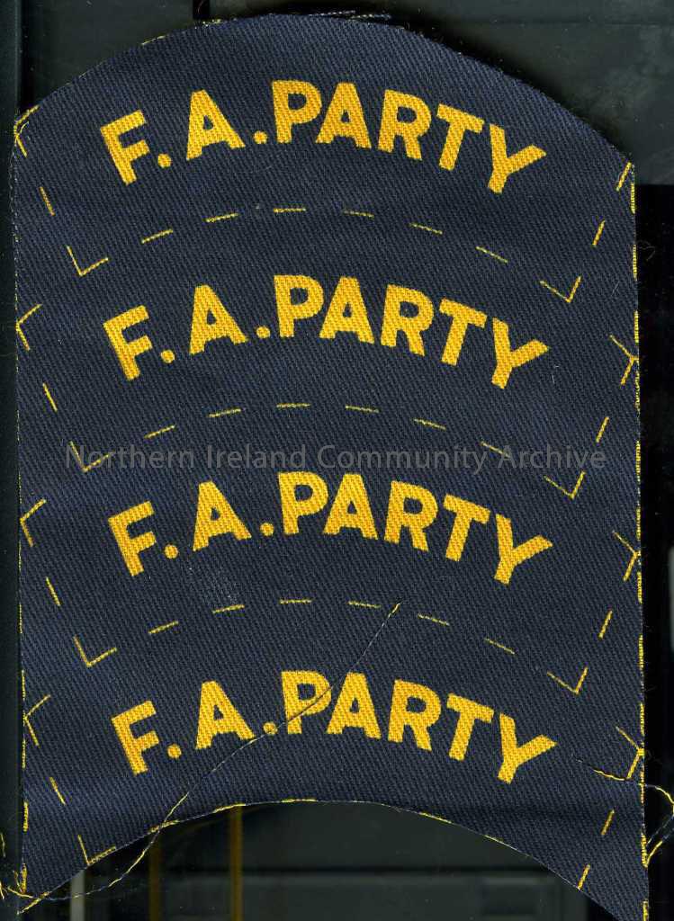 Navy with yellow writing – ‘F.A.Party’. Four on one piece of material.