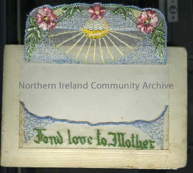 Embroidered postcard most likely from James to his mother – flowers, a sunset over water and ‘Fond love to Mother’. ‘Secret’ flap is empty.  – 84b