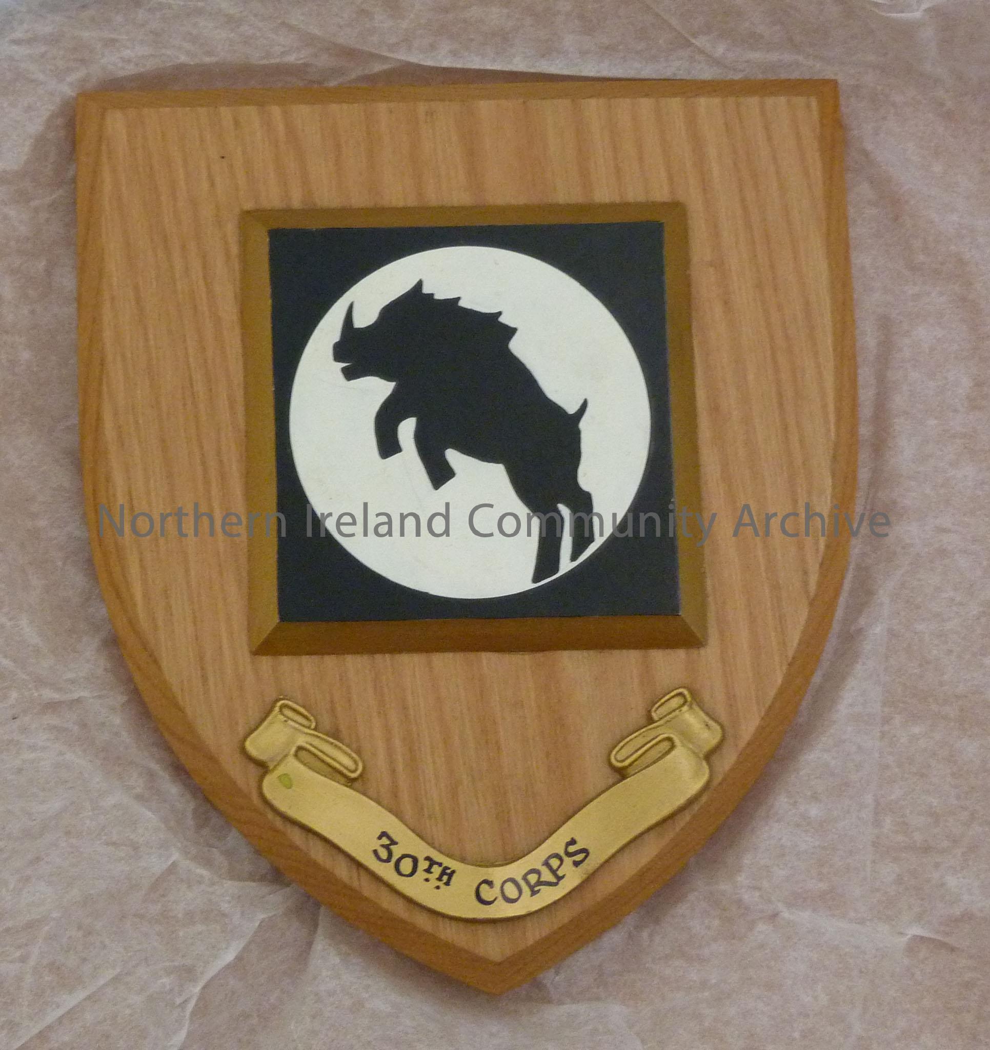 30th Corps shield with silhouette of a black boar in a white circle in a black square