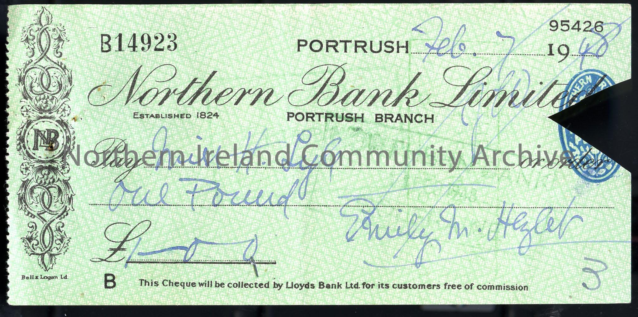 A cheque from ‘Northern Bank Limited’, ‘Portrush’ branch. Cheque no. ‘B14923’. Cheque payable to ‘Miss H. Lyle’ for ‘one pound’. Cheque signed by ‘Emi…