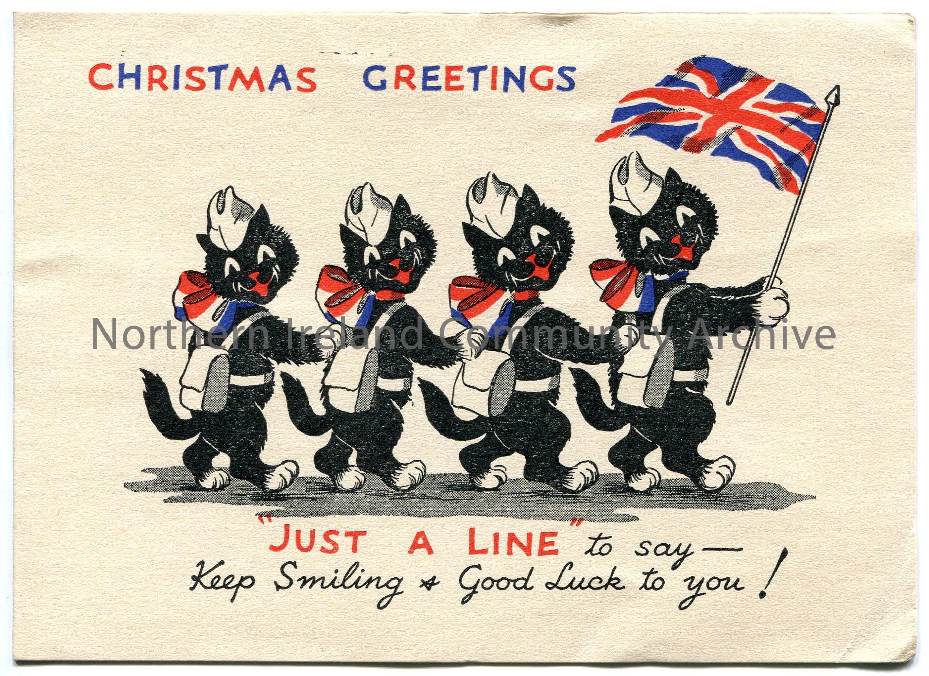 Christmas greetings card. Features four cats in a line, one of which is at the front holding a Union Jack flag. Printed on the front is ‘Just a Line t…