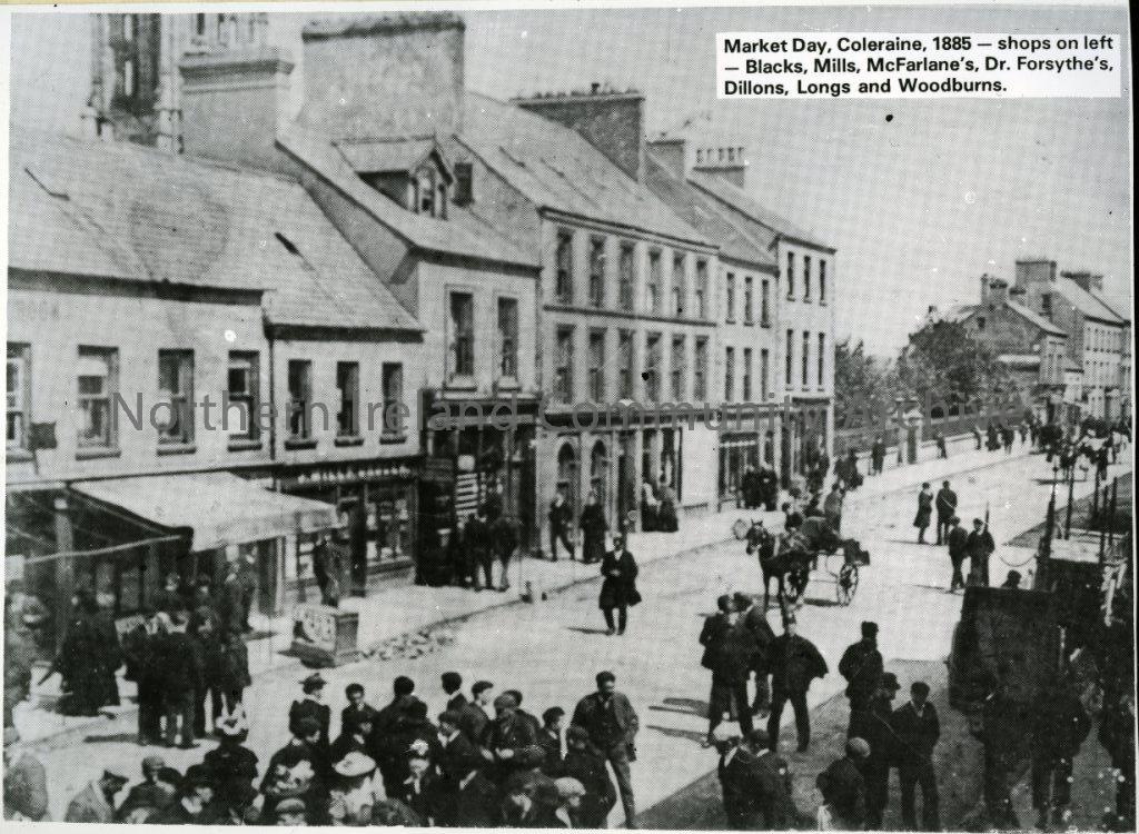 Market Day, Coleraine, 1885- shops on the left: Blacks, Mills, McFarlane’s, Dr Forsythe’s, Dillons, Longs and Woodburns. (4894)