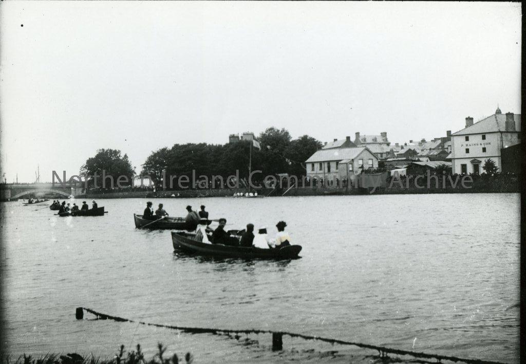 Black and White photograph of people in rowing boats on the River Bann, Coleraine. (Regatta Day, The Old Boathouse) (3289)