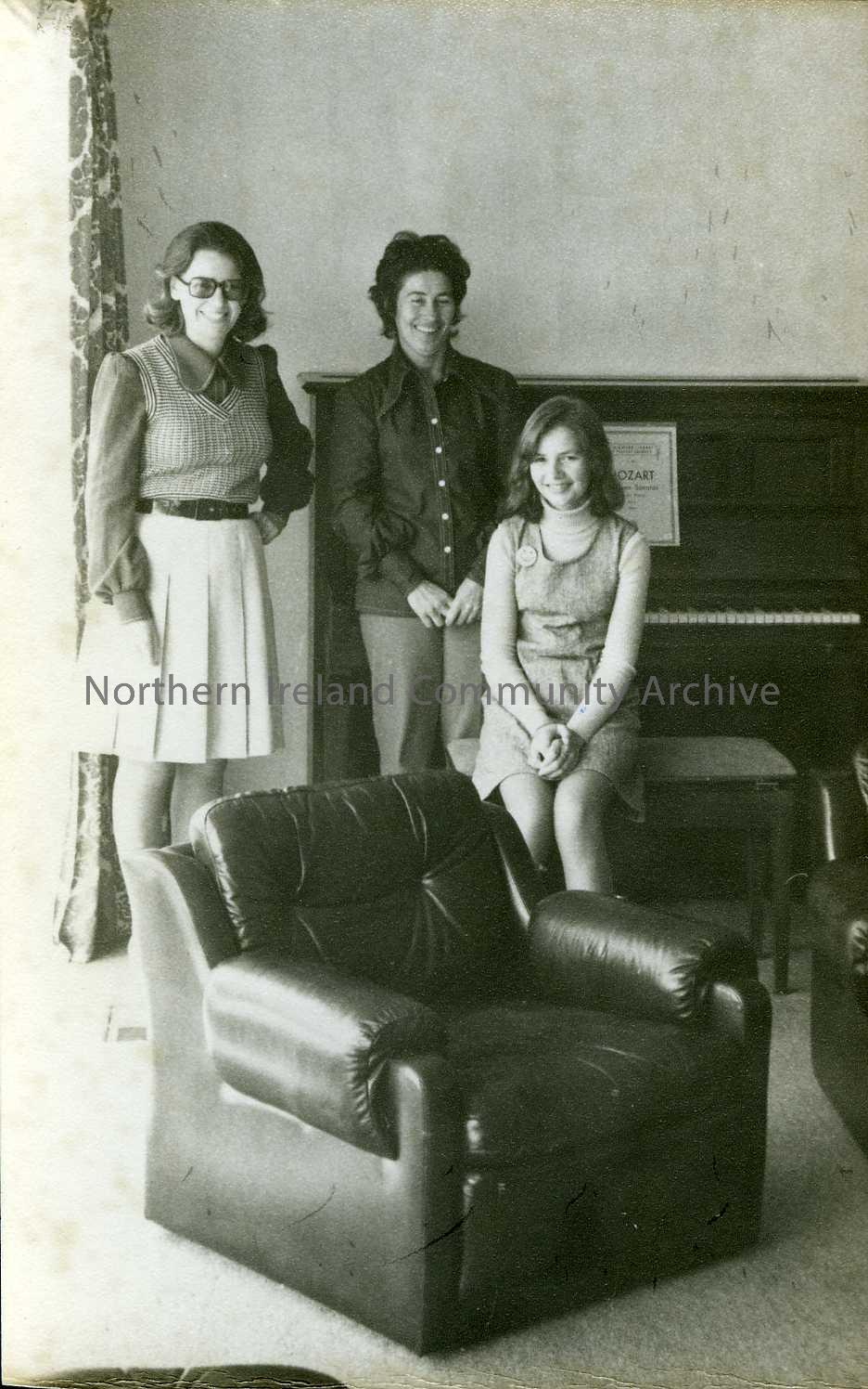 photograph depicting three ladies with piano (2027)