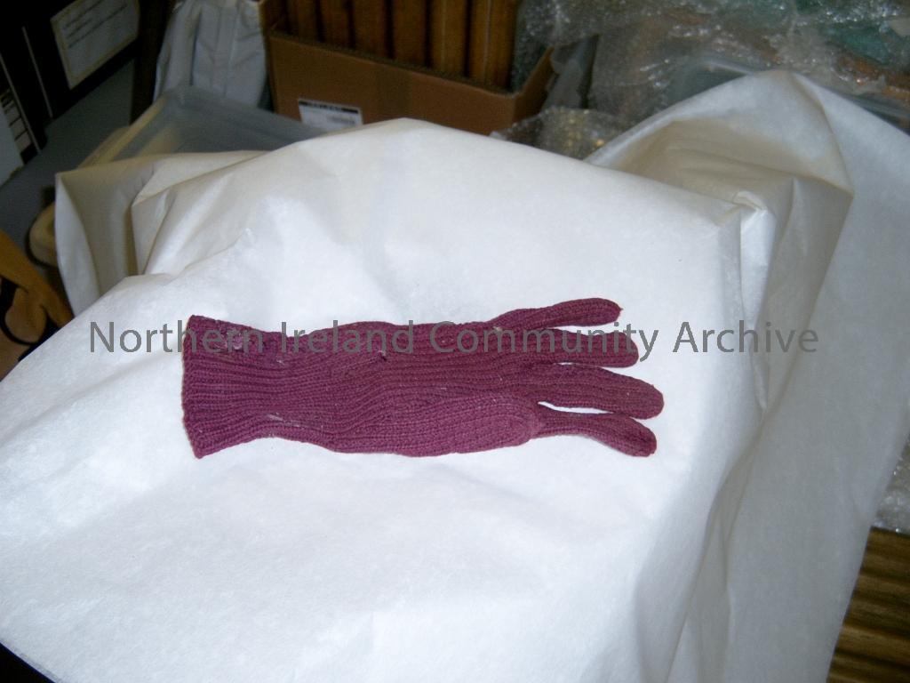 Purple woollen glove