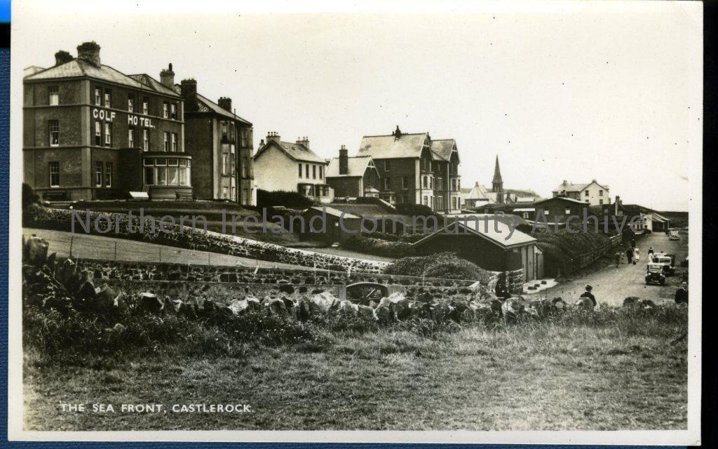 Black and white postcard of The Sea Front, Castlerock, circa early 20th century. Real Photo Productions (1784)