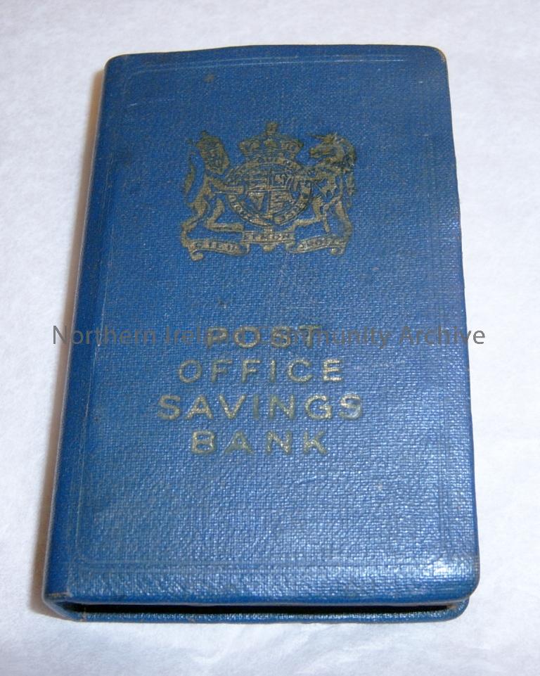 one locked box made from plastic and metal. Imprinted with Post Office Savings Bank. Above this in gold is a crest featuring the unicorn and lion. . The crown symbol is imprinted on the side in faded gold below which is the logo POSB. There is a at the bo (5637)