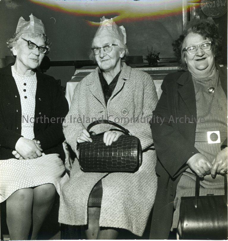 3 ladies at meals for wheels party