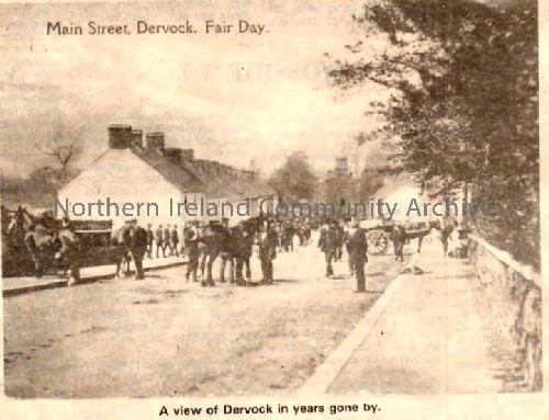 Dervock Main Street on a fair day, during the 1930s, from an old postcard. It is at the top of Main Street looking westward towards the cooperative building (4330)