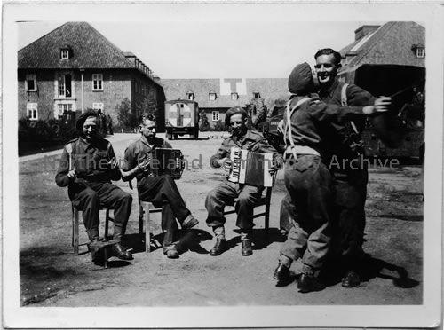 6th Light Anti-Aircraft (Coleraine) Battery relaxing while on campaign in Germany  (4190)