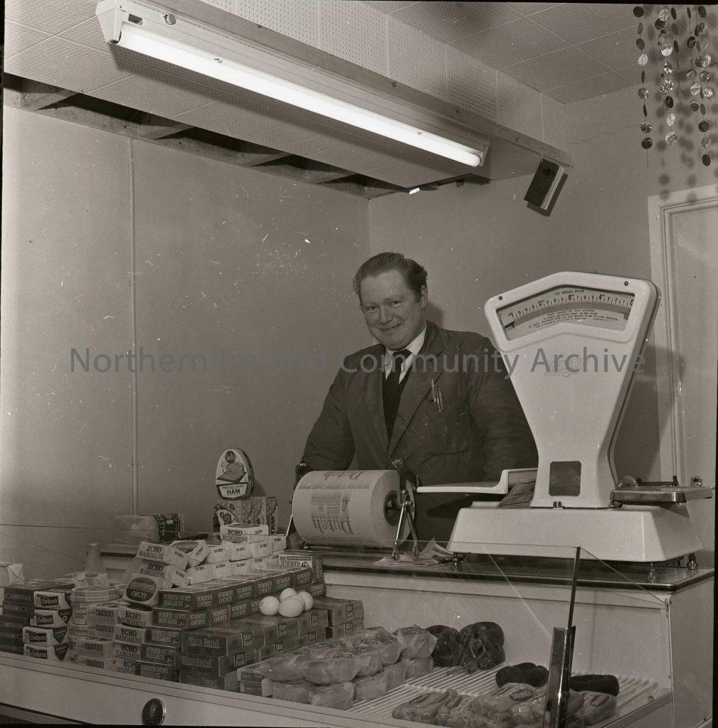 Portrush Grocery Shop, Blair, Dec 1965, man behind counter