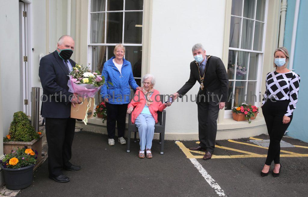 Centenarians receive commemorative coin from Mayor of Causeway Coast and Glens Borough Council – Elizabeth MacRory
