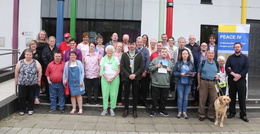 Participants of the PEACE IV Accessible Heritage programme with the then Mayor of Causeway Coast and Glens, Cllr Sean Bateson.